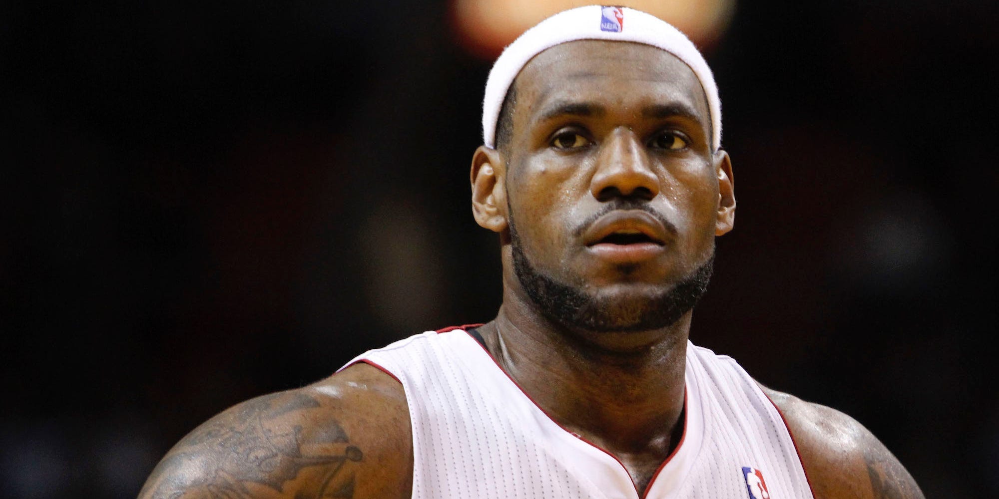 LeBron James looks off in the distance with the Miami Heat in 2010.
