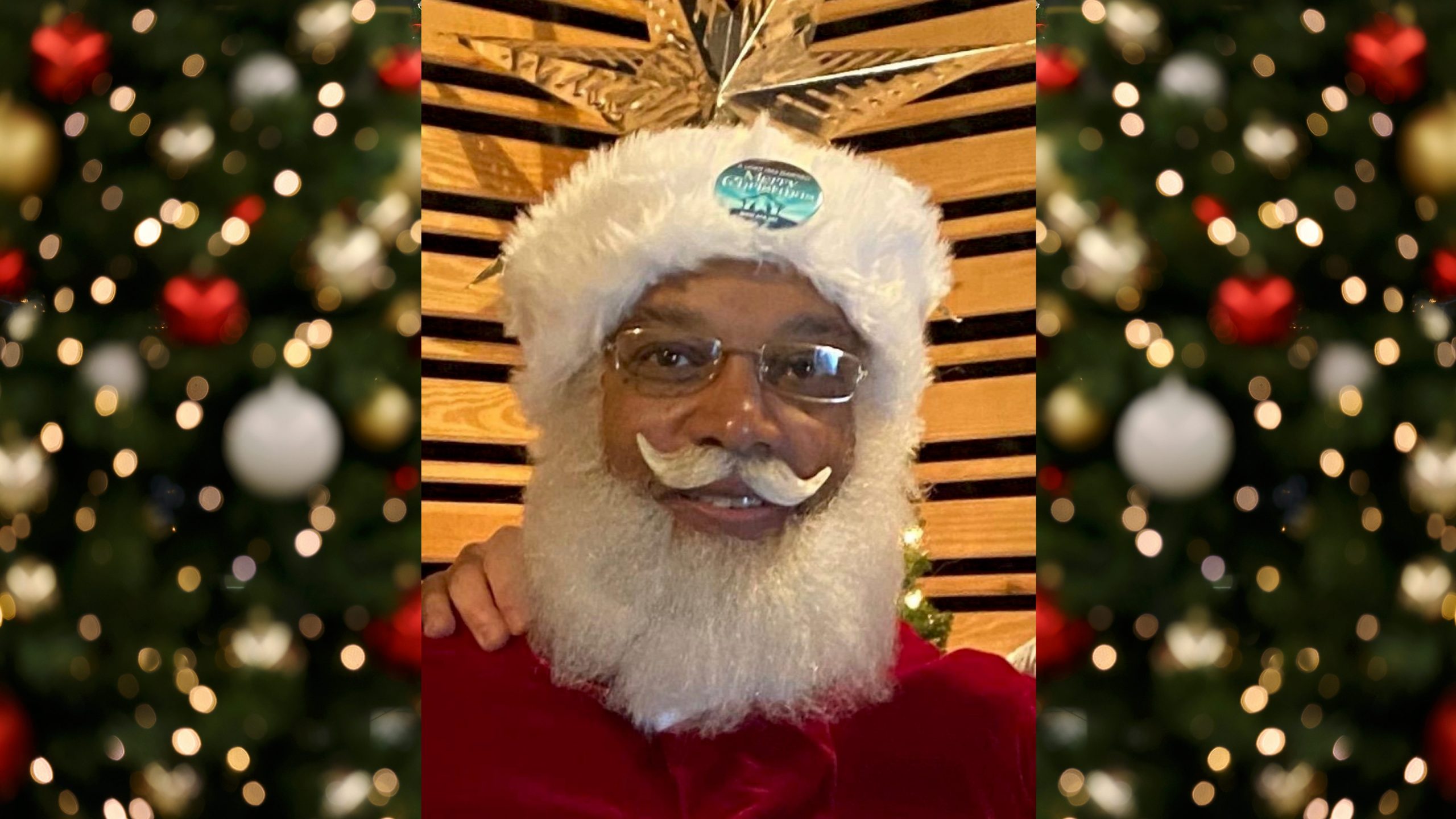 Stafford Braxton, the founder of Santas Just Like Me, dressed as a Black Santa.