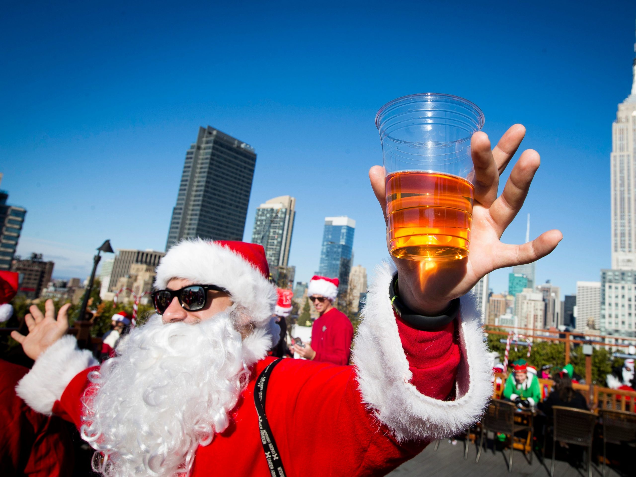 Santa Con Santa Claus New York Christmas beer drinking