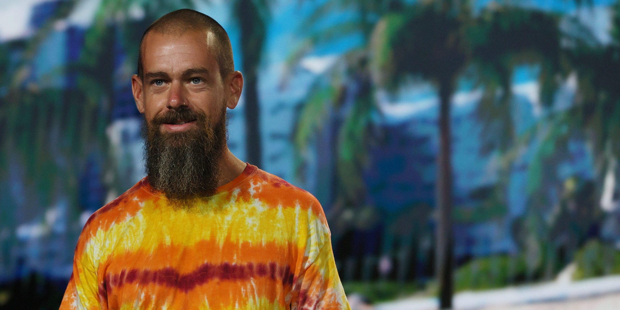 Jack Dorsey wearing tie-dye shirt onstage