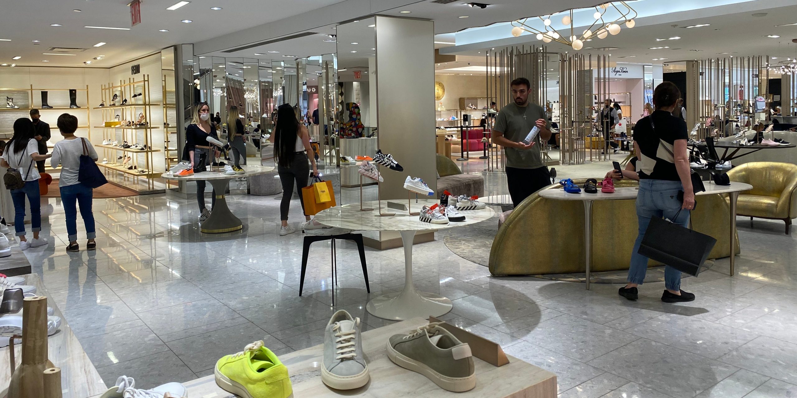 Shoppers in the shoe department at Saks. Michelle Gross