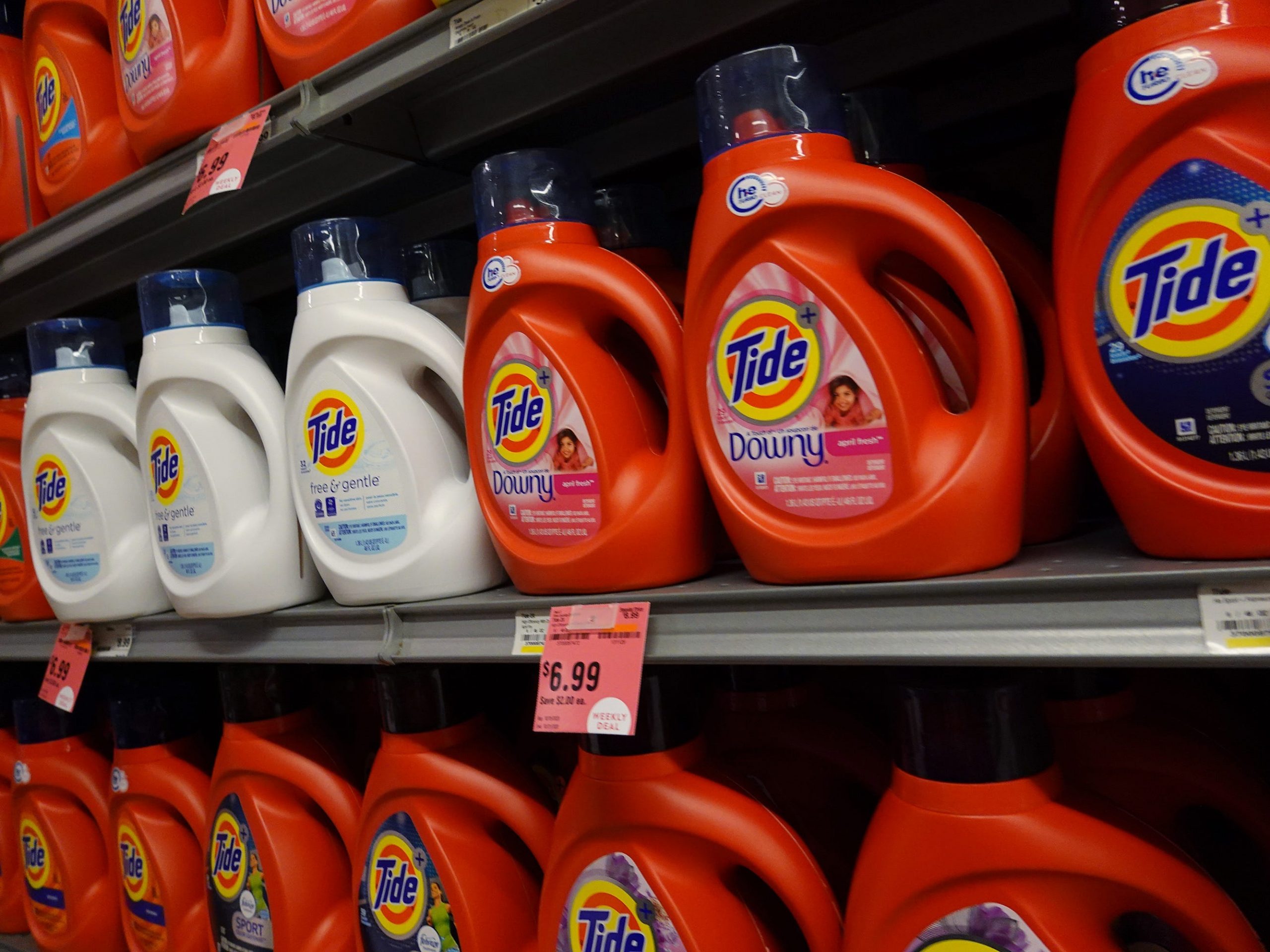 Tide detergent on supermarket shelves.