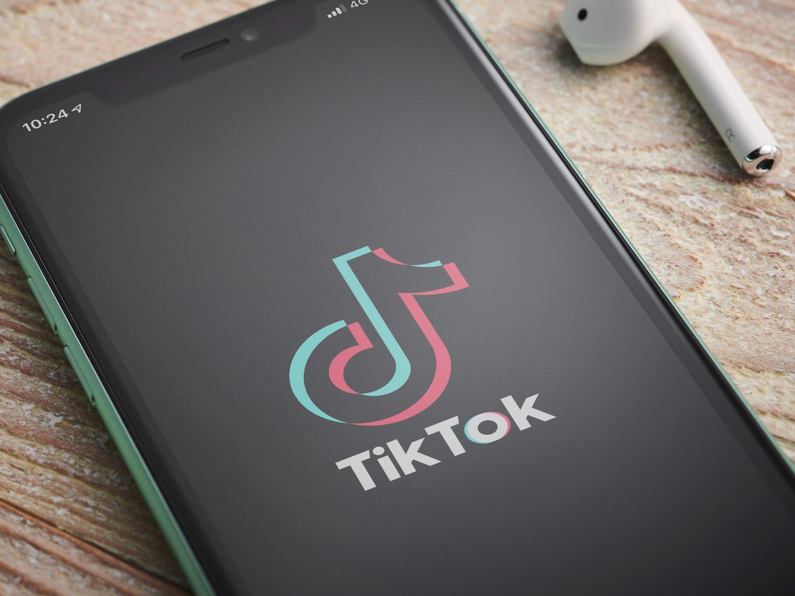 TikTok logo on phone screen