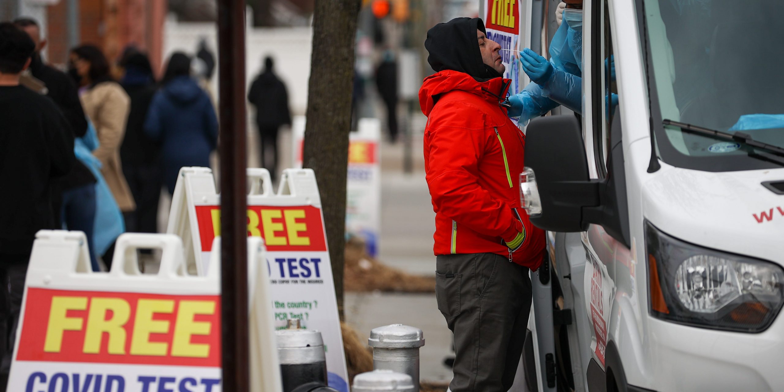 A man is getting a Covid-19 test at a Covid-19 testing center next to the Queens Hospital Center as hundreds of residents line up to get Covid-19 test in Queens of New York, United States on December 28, 2021 as Omicron rises around the country.