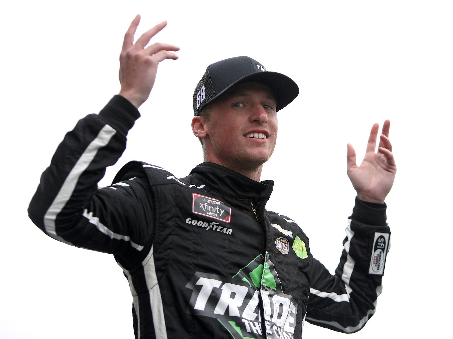 KANSAS CITY, KANSAS - OCTOBER 23: Brandon Brown, driver of the #68 TradeTheChain.com Chevrolet, waves to fans during pre-race ceremonies prior to the NASCAR Xfinity Series Kansas Lottery 300 at Kansas Speedway on October 23, 2021 in Kansas City, Kansas. (Photo by Sean Gardner/Getty Images)