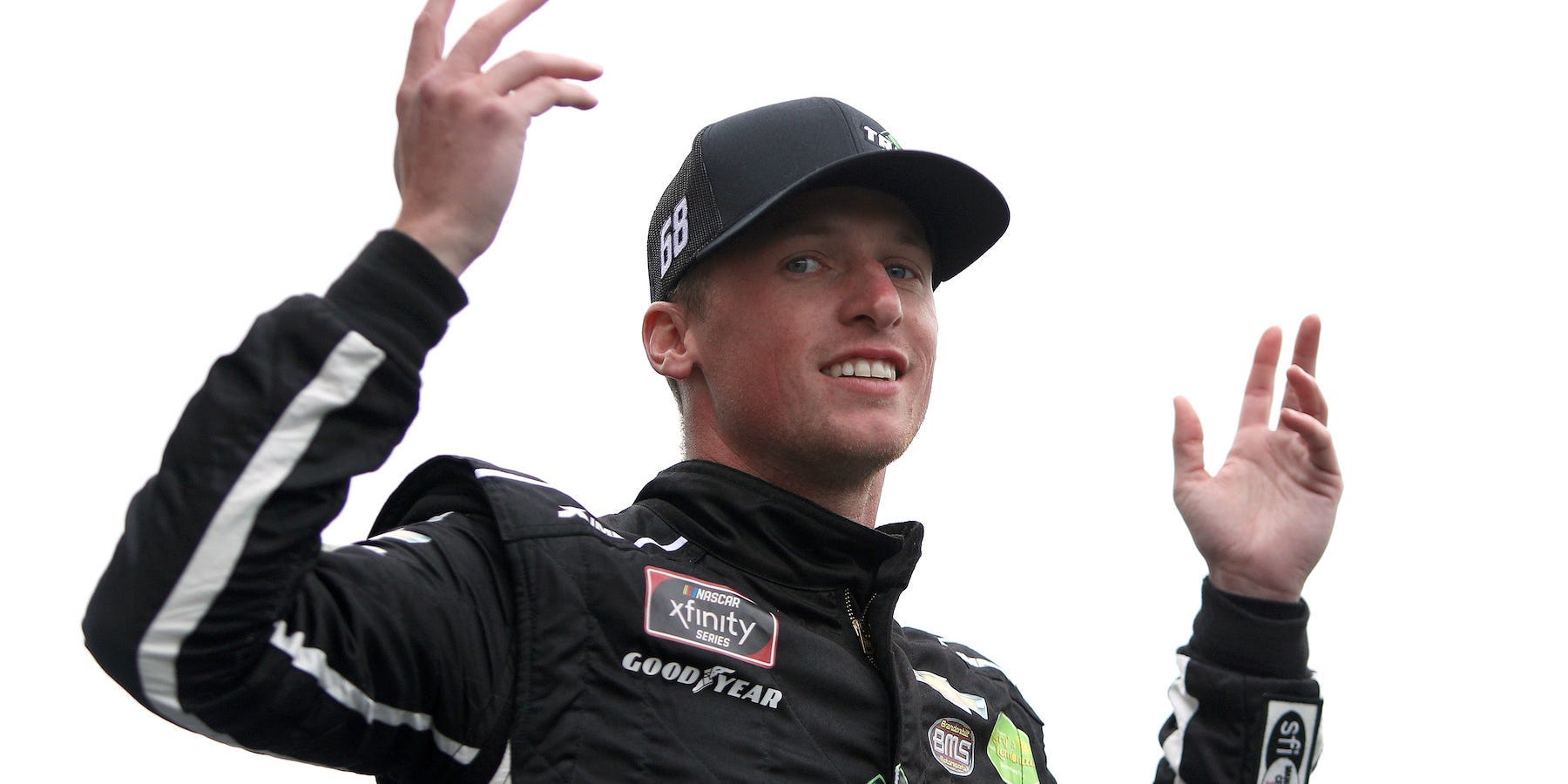 KANSAS CITY, KANSAS - OCTOBER 23: Brandon Brown, driver of the #68 TradeTheChain.com Chevrolet, waves to fans during pre-race ceremonies prior to the NASCAR Xfinity Series Kansas Lottery 300 at Kansas Speedway on October 23, 2021 in Kansas City, Kansas. (Photo by Sean Gardner/Getty Images)