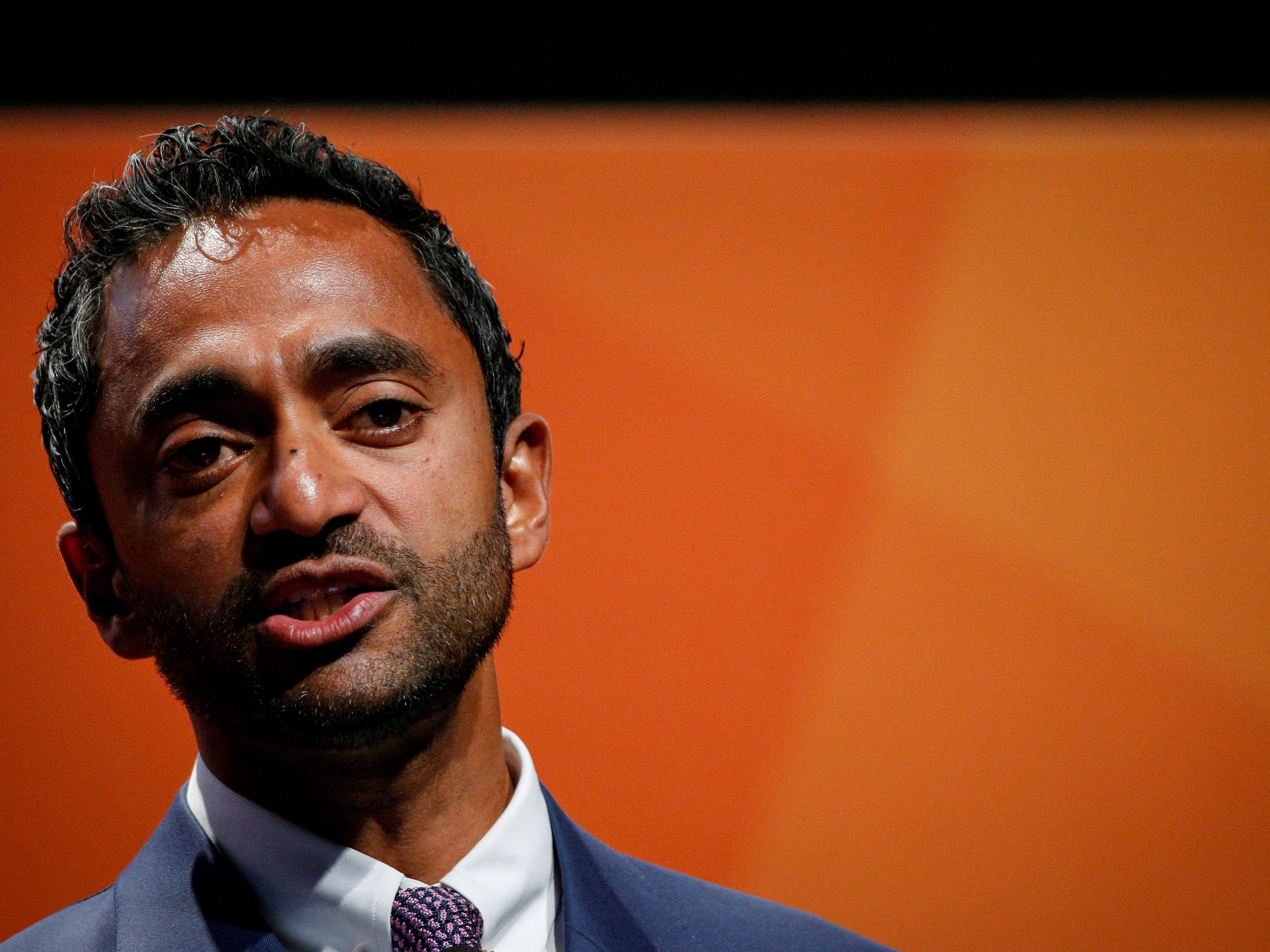 FILE PHOTO: Chamath Palihapitiya, Founder and CEO of Social Capital, presents during the 2018 Sohn Investment Conference in New York City, U.S., April 23, 2018. REUTERS/Brendan McDermid/File Photo