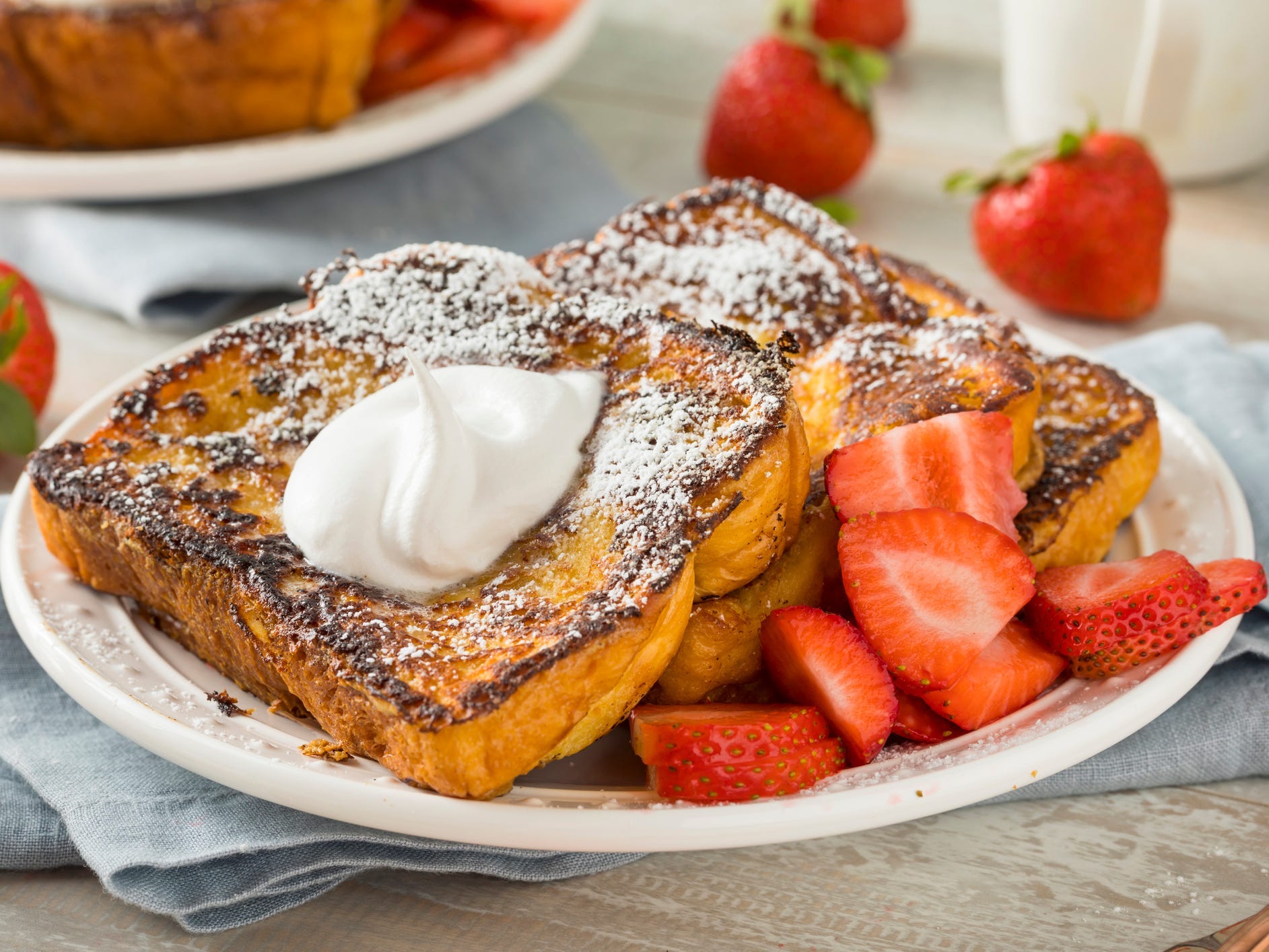 Brioche french toast with strawberries and whipped cream