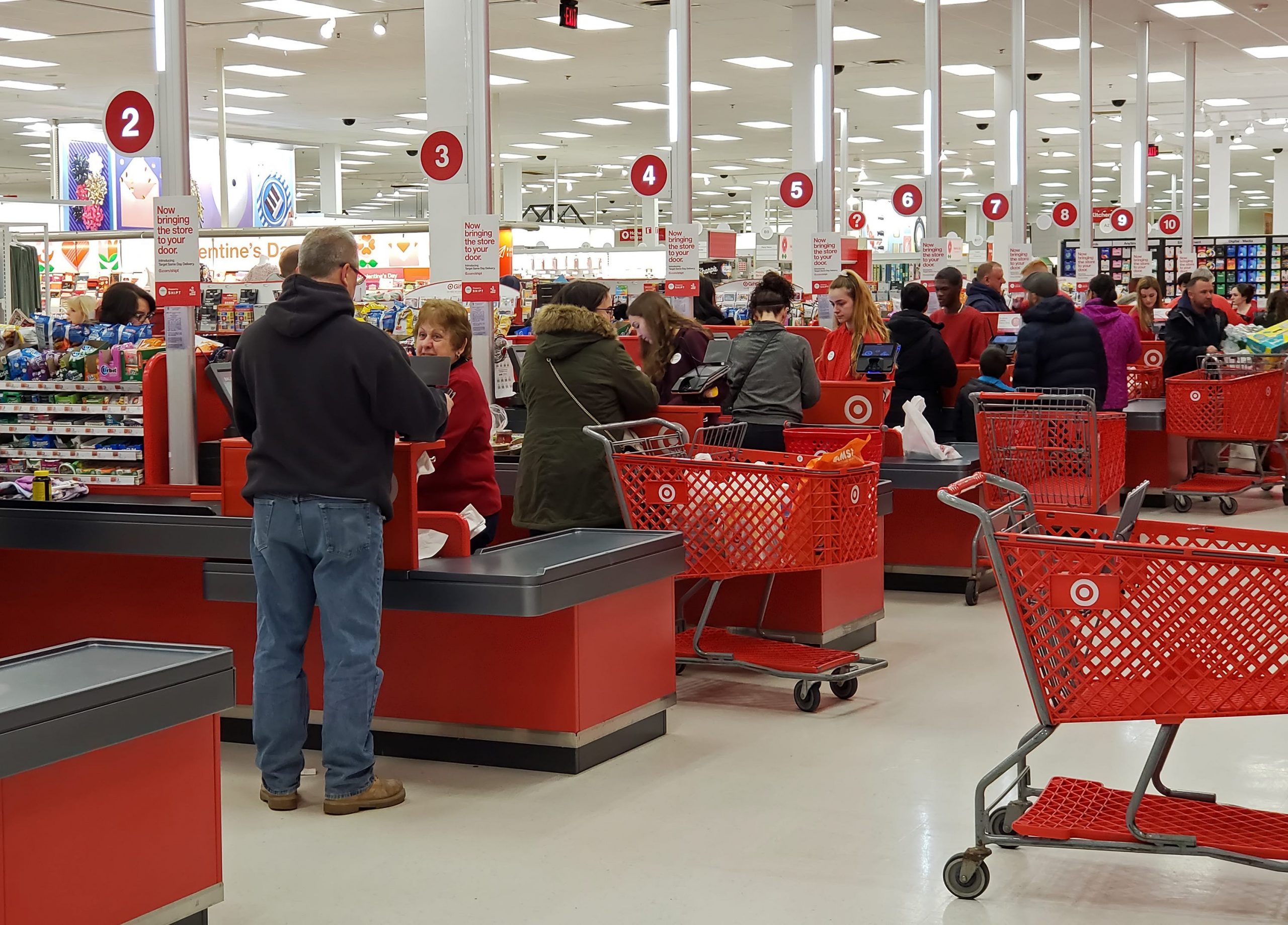 check out lines at target filled with customers and cashiers