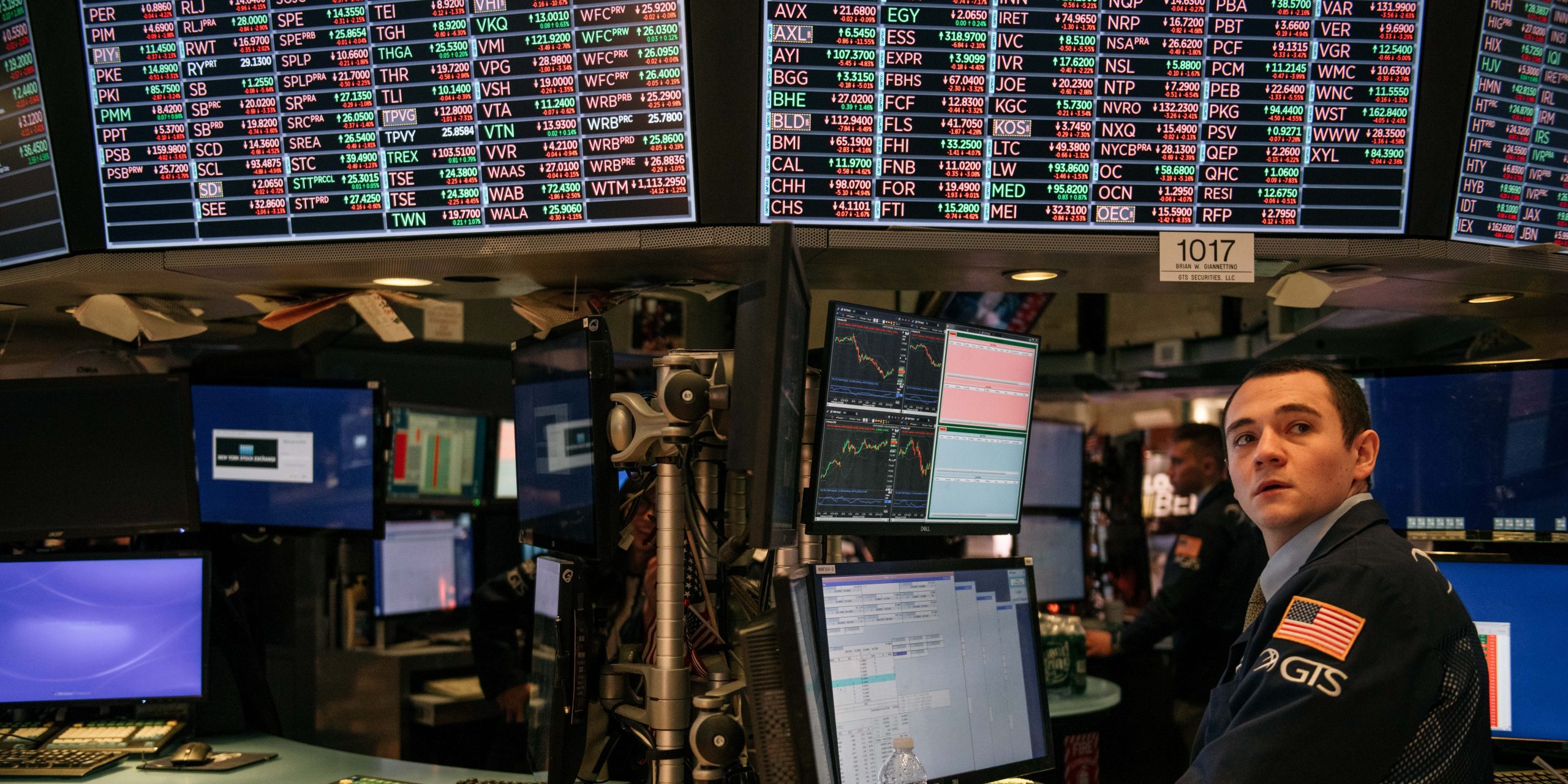 Traders work through the closing minutes of trading Tuesday on the New York Stock Exchange floor on February 25, 2020 in New York City.