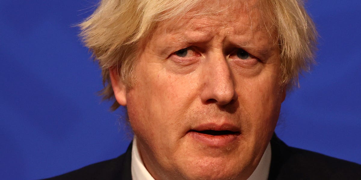 British prime Minister Boris Johnson gives a press conference at 10 Downing Street on December 8, 2021