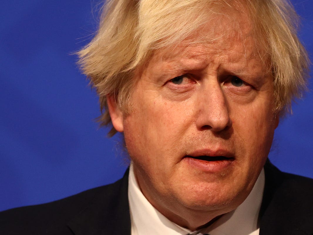 British prime Minister Boris Johnson gives a press conference at 10 Downing Street on December 8, 2021