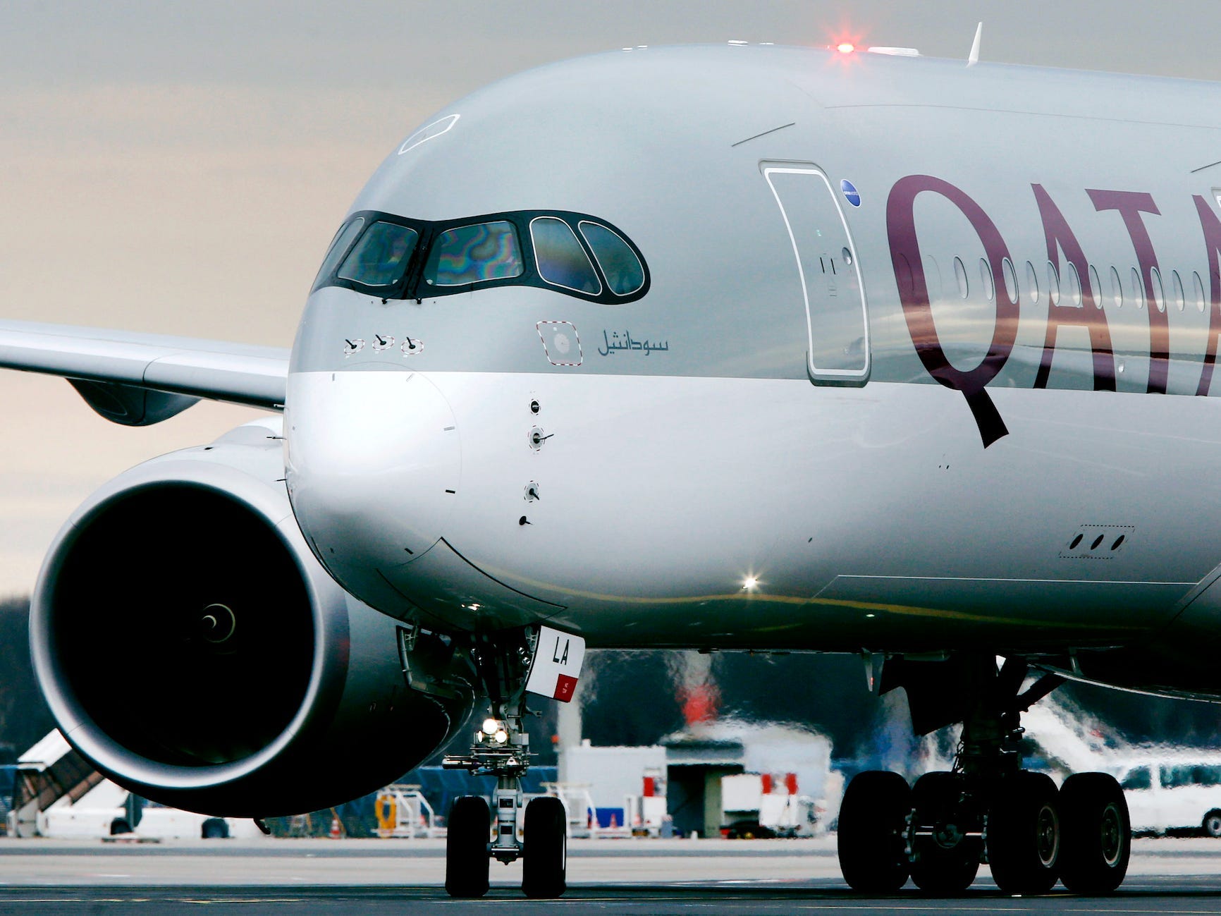 The front of a Qatar Airways plane.