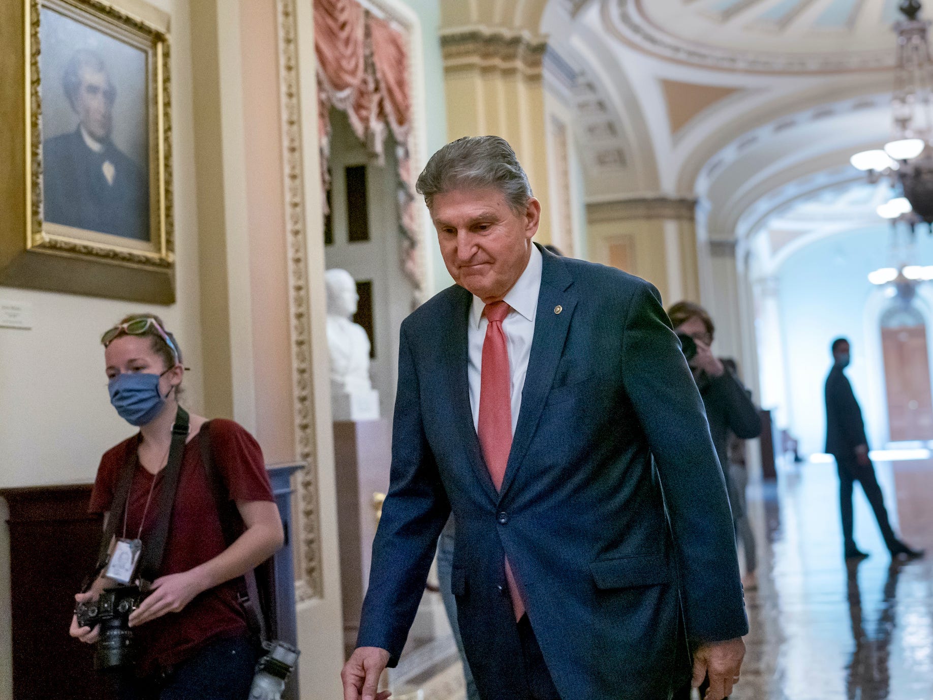 Sen. Joe Manchin, D-W.Va., walks to a caucus lunch at the Capitol in Washington, Dec. 17, 2021. Manchin said Sunday, Dec. 19, 2021 he cannot back a $2 trillion social safety net bill, dealing a potentially fatal blow to President Joe Biden’s signature legislation