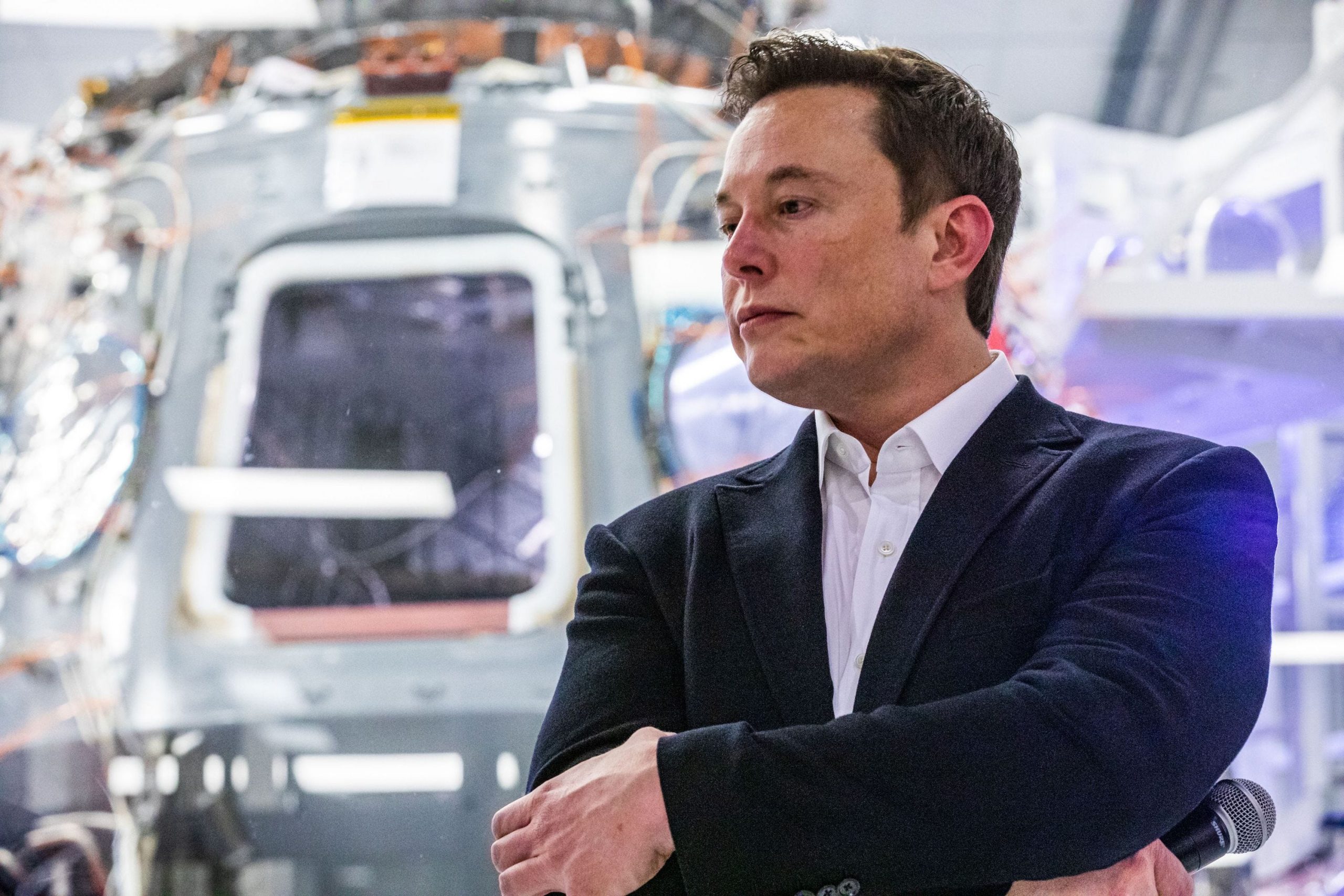 SpaceX founder Elon Musk addresses members of the media during a press conference announcing new developments of the Crew Dragon reusable spacecraft, at SpaceX headquarters in Hawthorne, California on October 10, 2019.