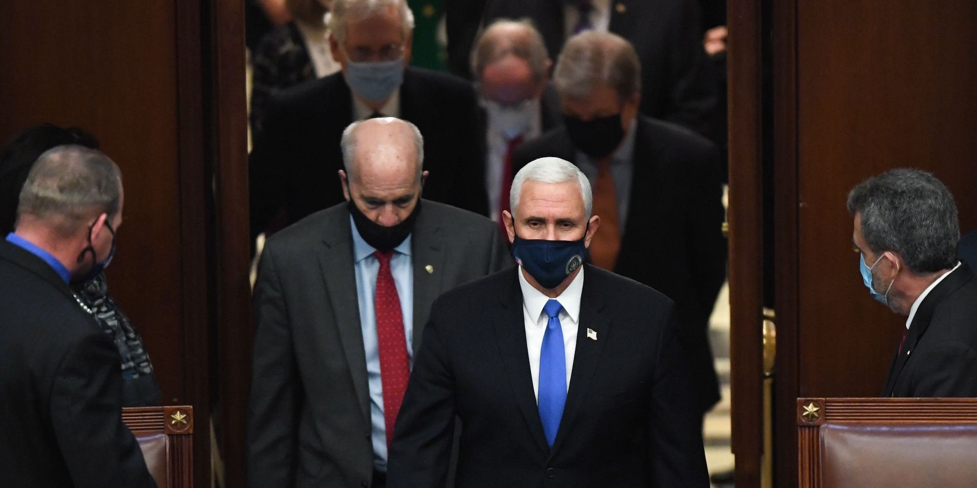 Former Vice President Mike Pence arrives at the House Chamber following the assault on the US Capitol on January 6, 2021.