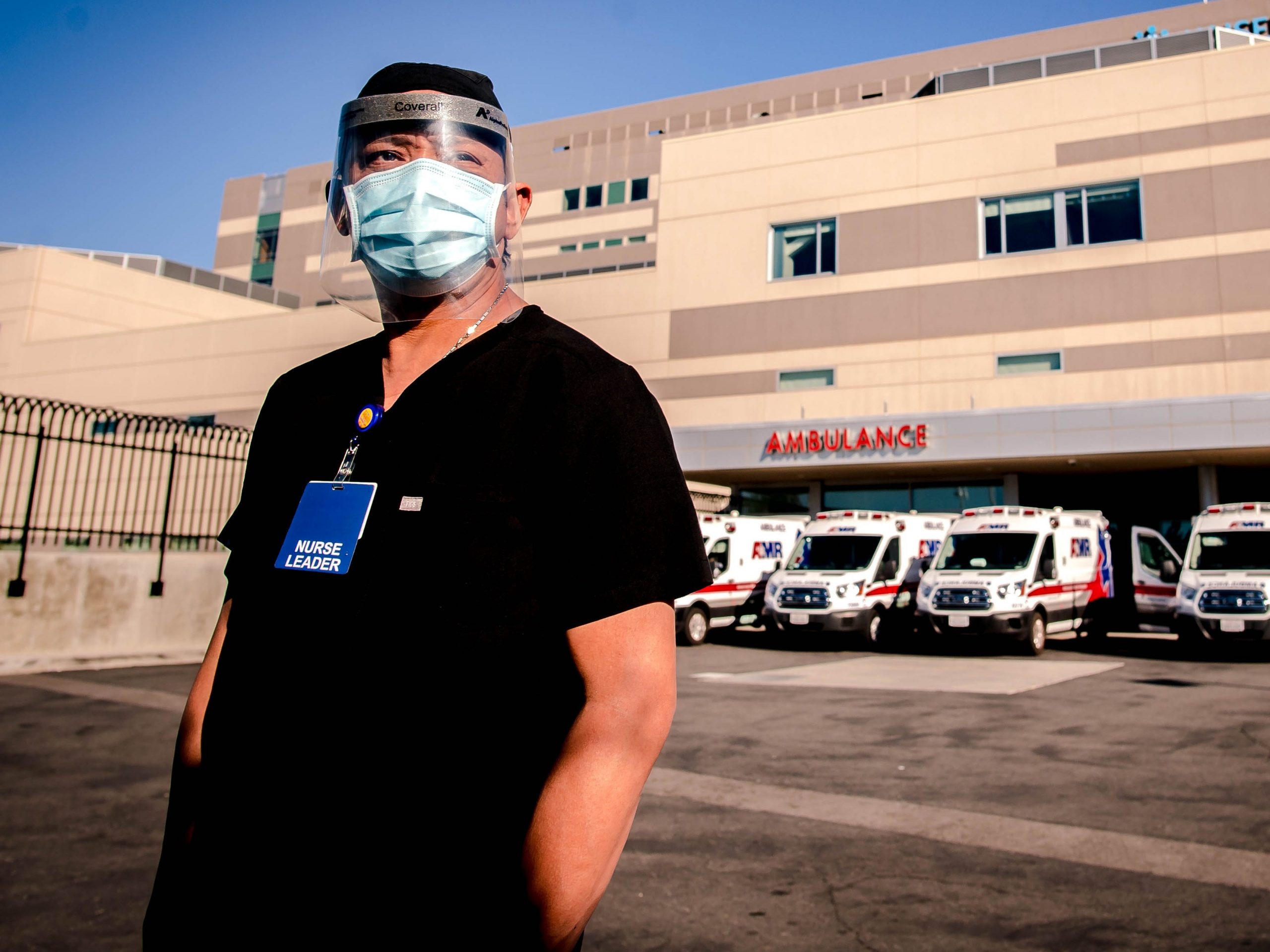 Marcial Reyes, an ER nurse and a COVID-19 survivor, stands outside the ambulance entrance at the Kaiser Permanente Medical Center in Fontana on Monday, Jan. 18, 2021.