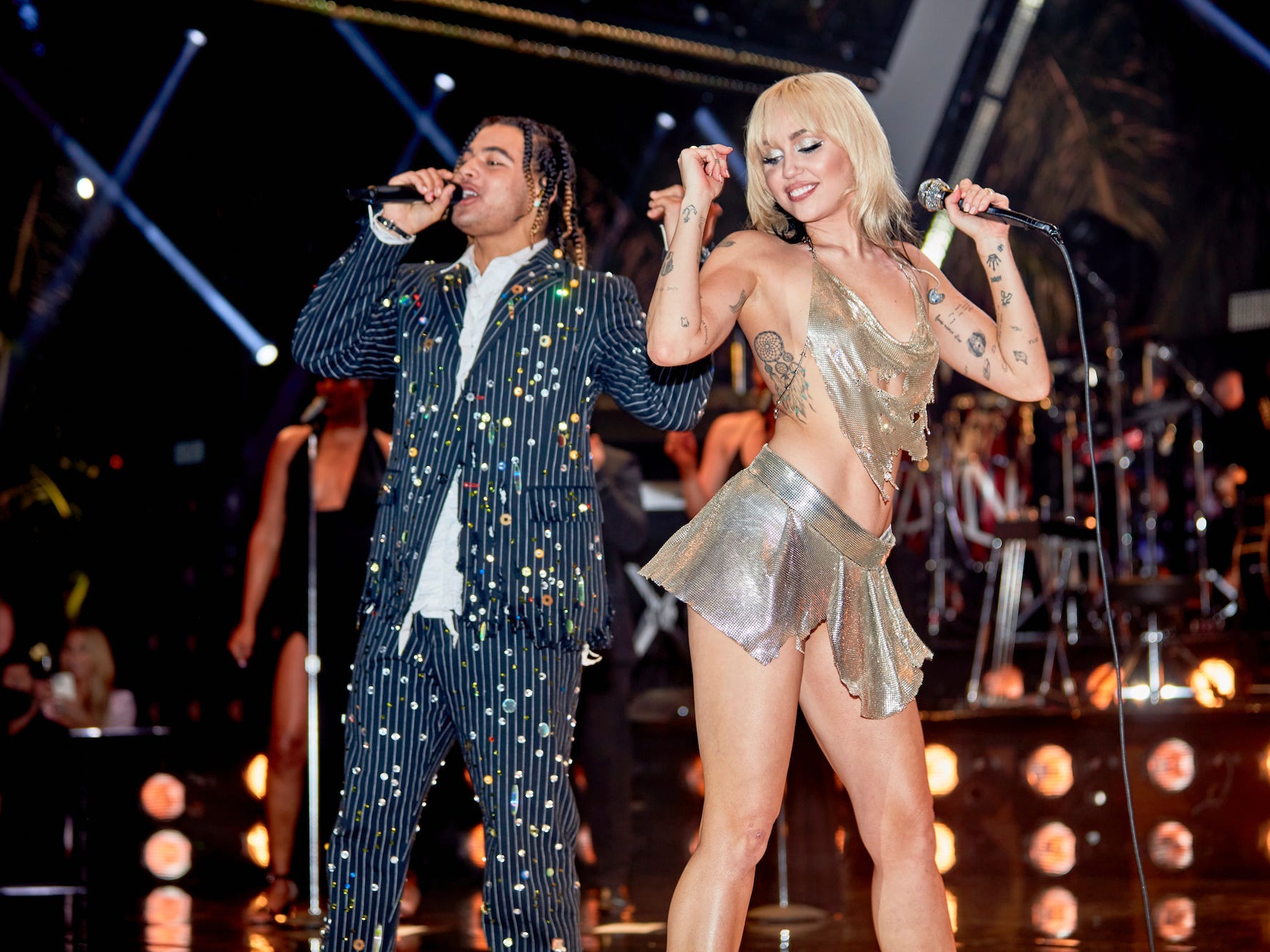 Miley Cyrus and 24kGoldn perform in Florida on New Year's Eve 2021.
