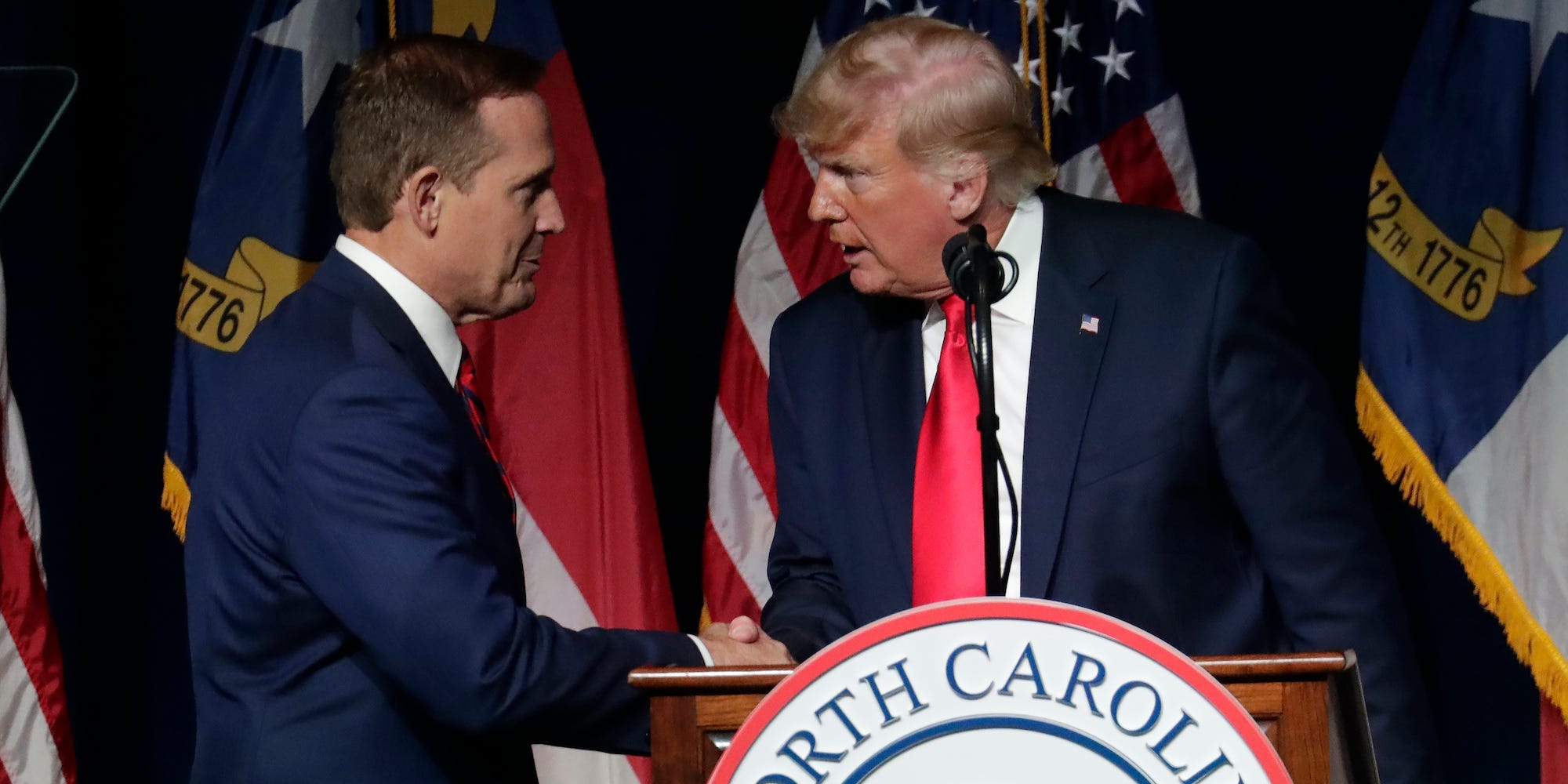 In this June 5, 2021, file photo, former President Donald Trump, right, announces his endorsement of North Carolina Rep. Ted Budd, left, for the 2022 North Carolina U.S. Senate seat