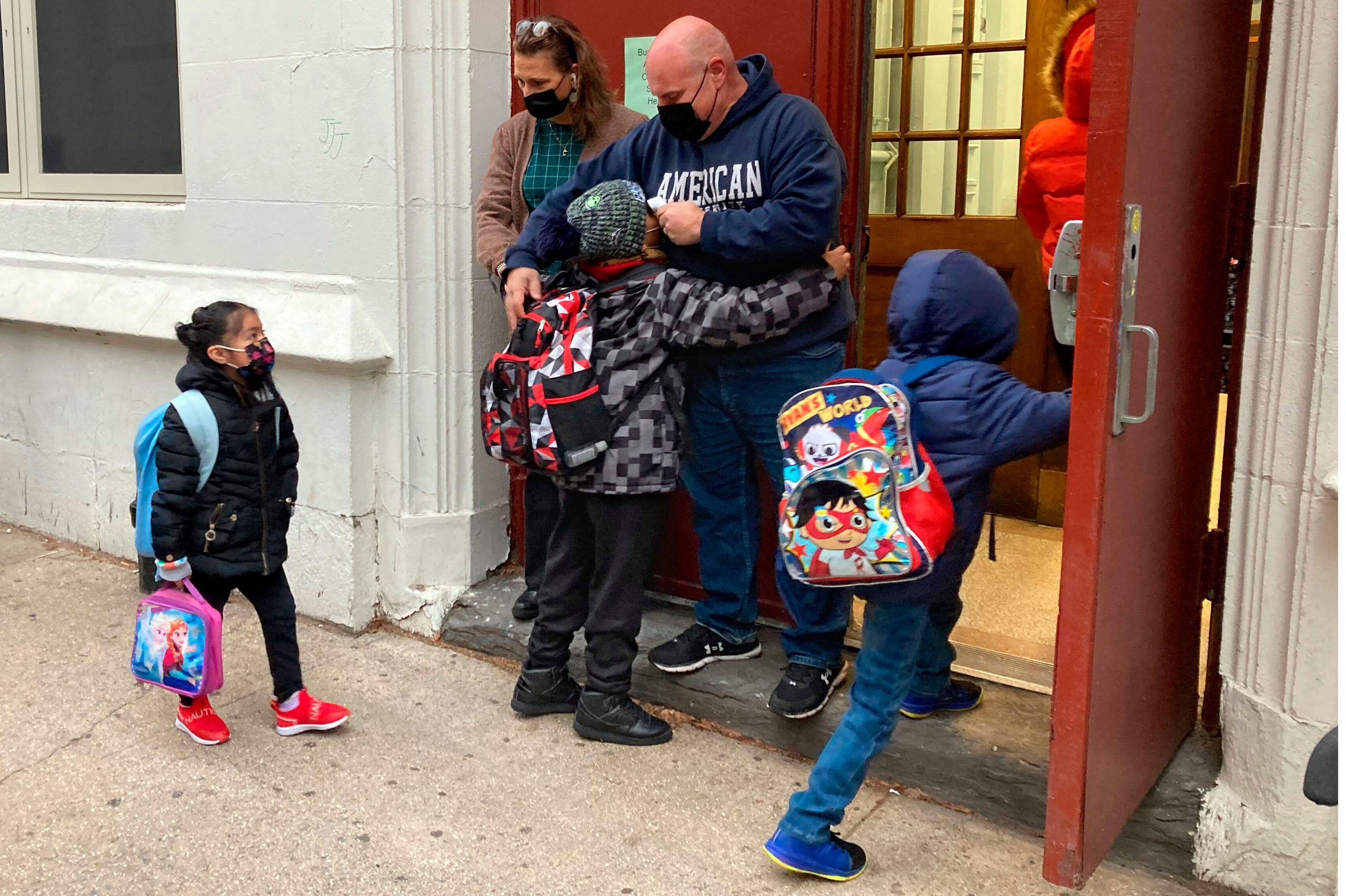 Students return to school in New York City.