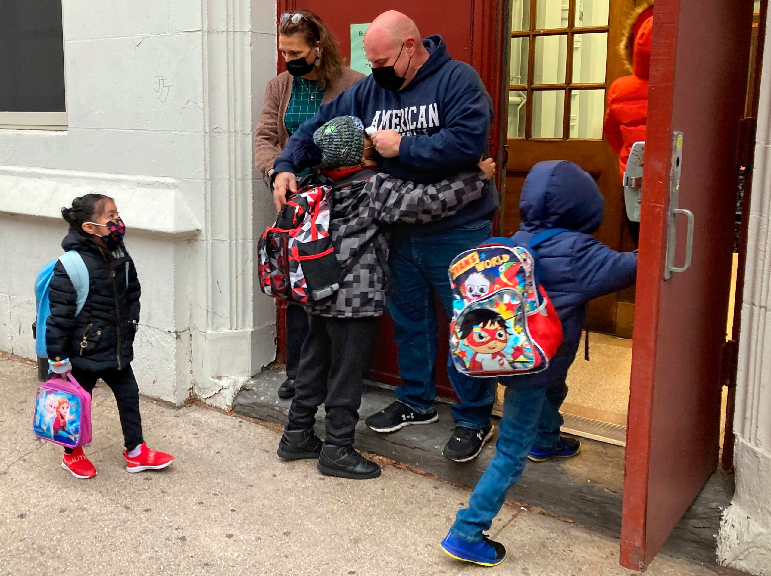 Students return to school in New York City.