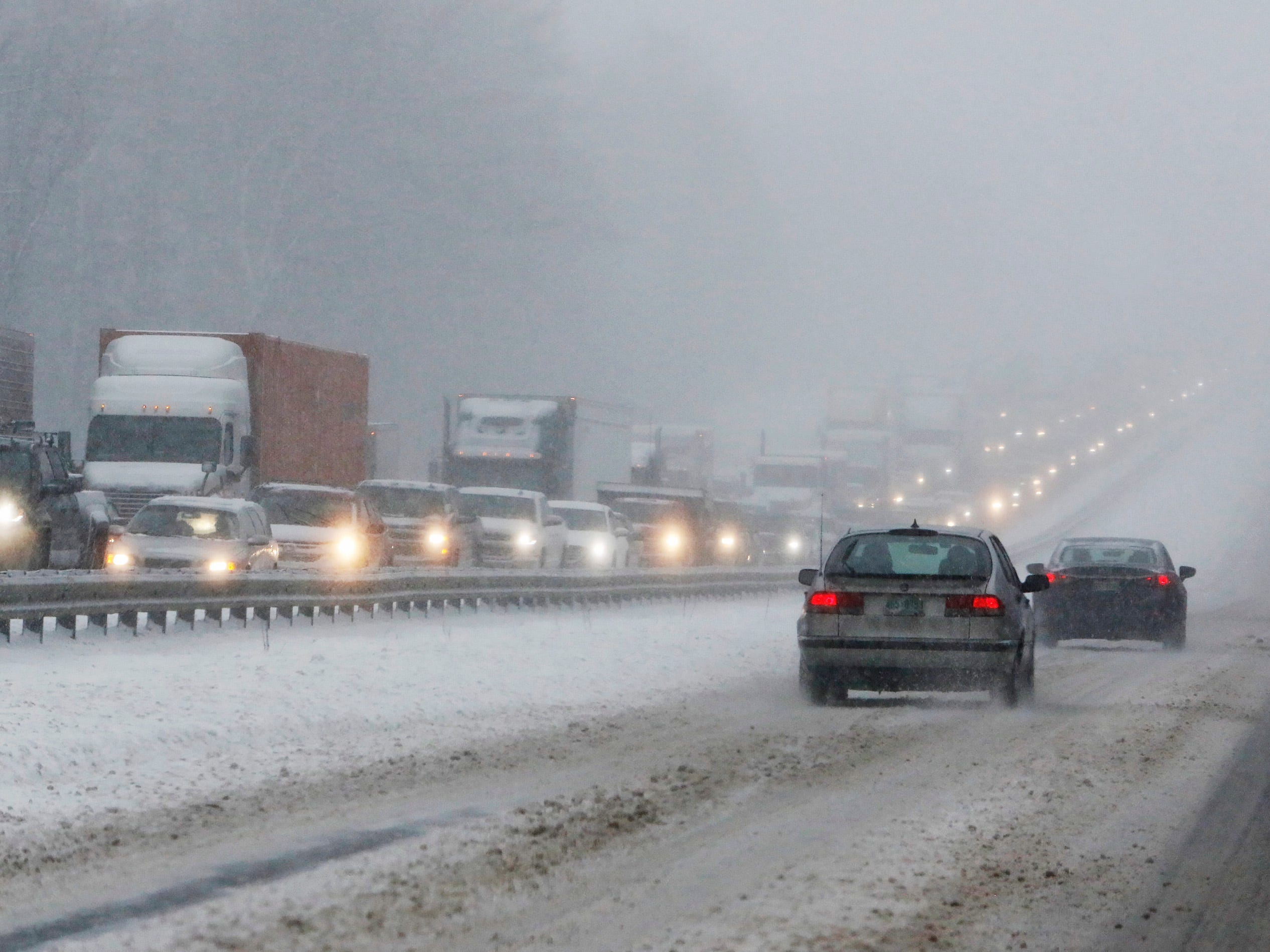 Northbound traffic on I-95 is at a standstill following a tractor trailer that jack-knived in the snowstorm.