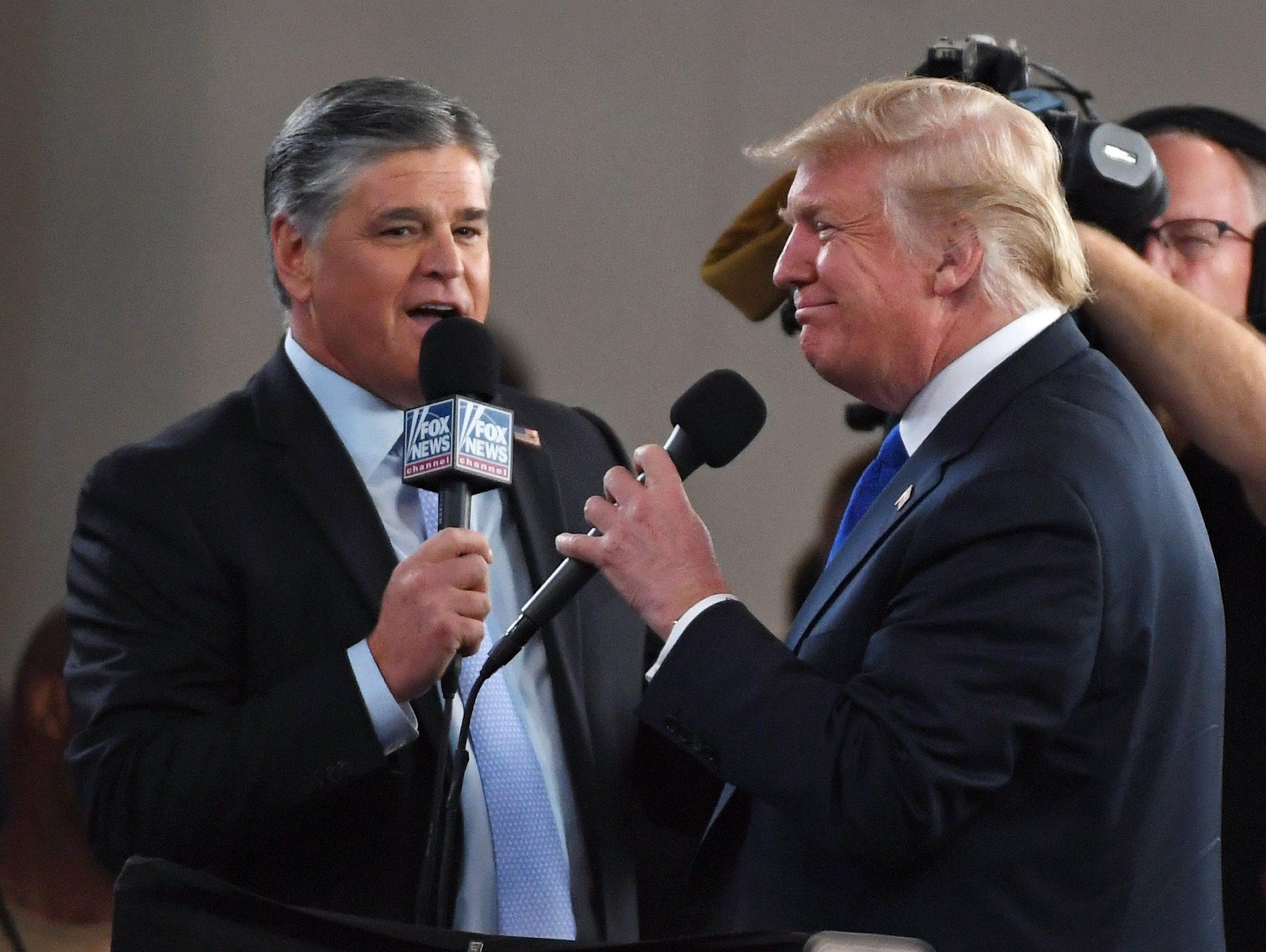 Fox News Channel and radio talk show host Sean Hannity (L) interviews U.S. President Donald Trump before a campaign rally at the Las Vegas Convention Center on September 20, 2018 in Las Vegas, Nevada.