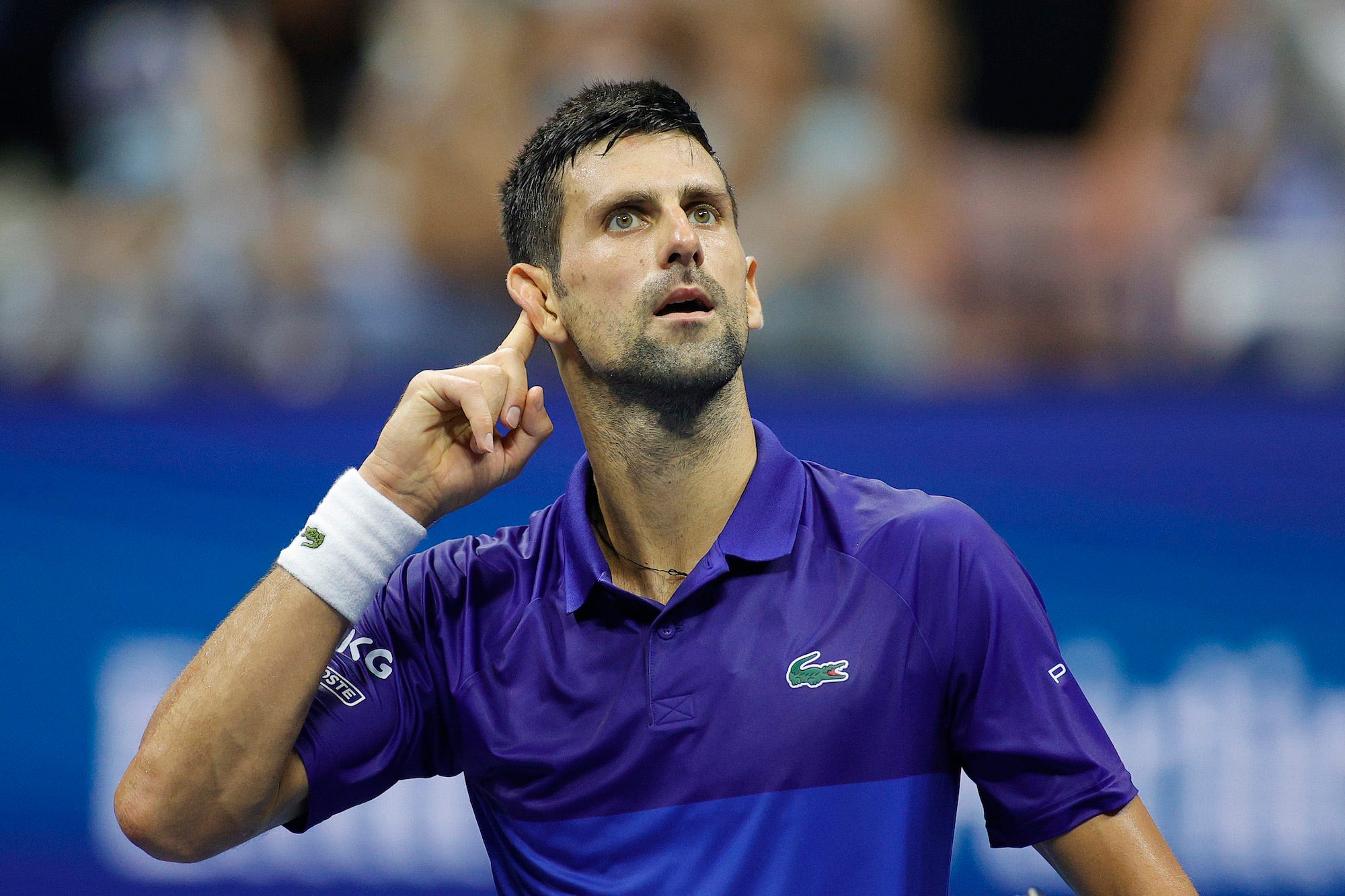 Novak Djokovic of Serbia reacts to the crowd as he plays against Matteo Berrettini of Italy during his Men's Singles quarterfinal match on Day Ten of the 2021 US Open at the USTA Billie Jean King National Tennis Center