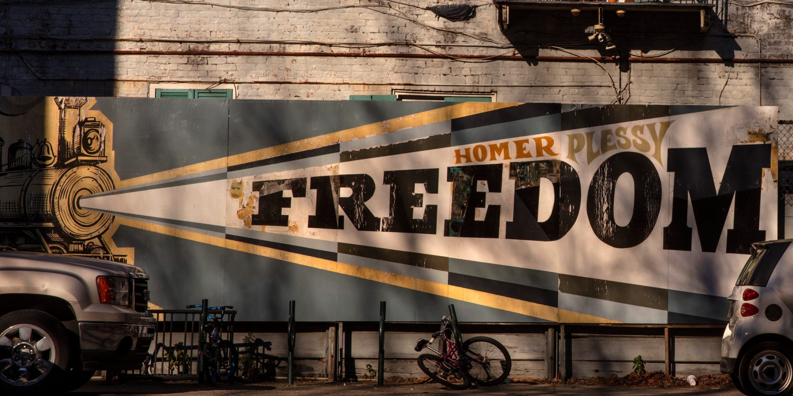 Sign with a train with Homer Plessy Freedom printed on it on 26th February 2020 at Homer Plessy Community School, New Orleans, Louisiana, United States