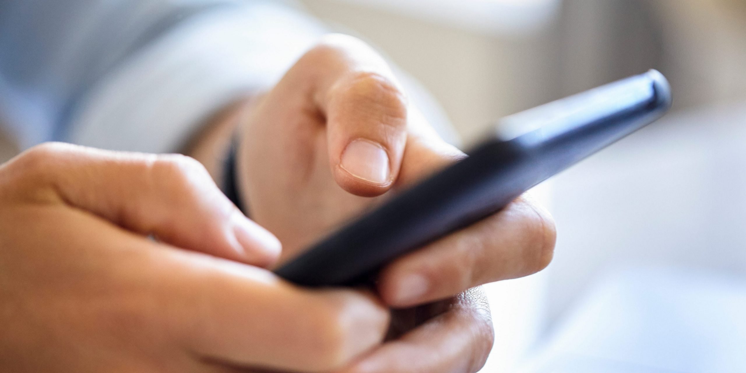 Image of a phone in a pair of hands