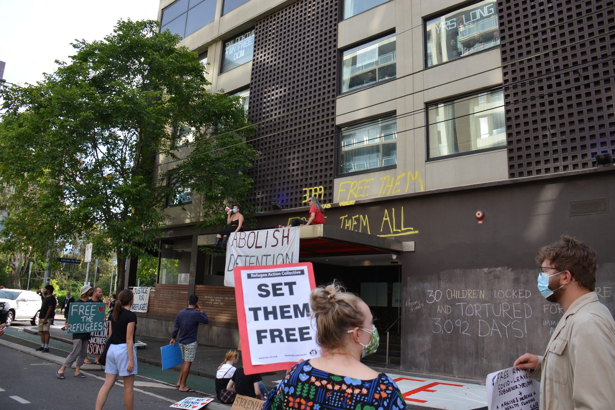 Supporters gather outside Park Hotel where Novak Djokovic was taken pending his removal from the country after his visa was cancelled by the Australian Border Force in Melbourne, Australia on January 06, 2022. Djokovic arrived in Melbourne to play in the upcoming Australian Open and was denied entry to Australia as border authorities cancelled his visa