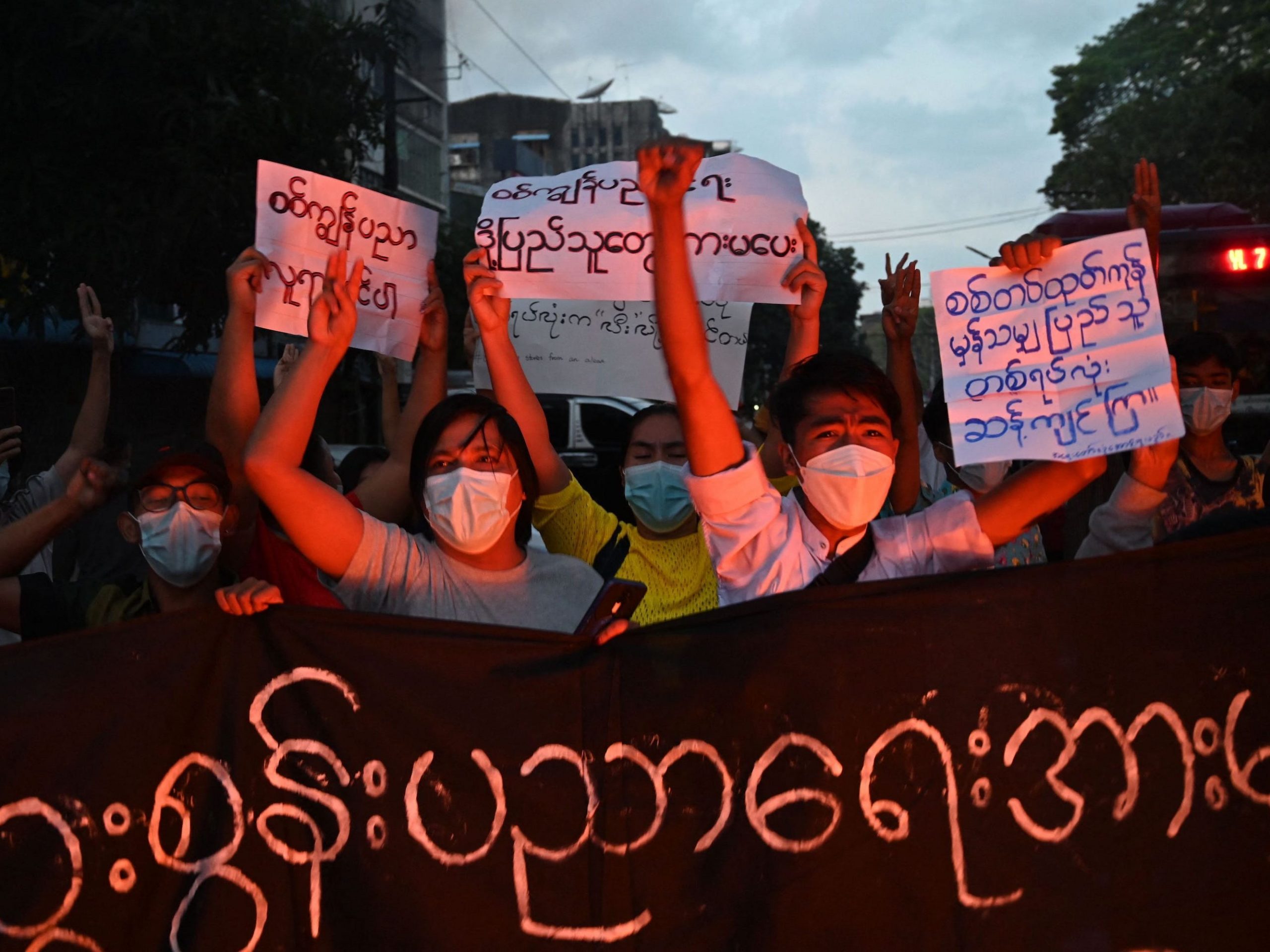 Protesters take part in a demonstration against the military coup in Yangon, Myanmar on November 10, 2021.