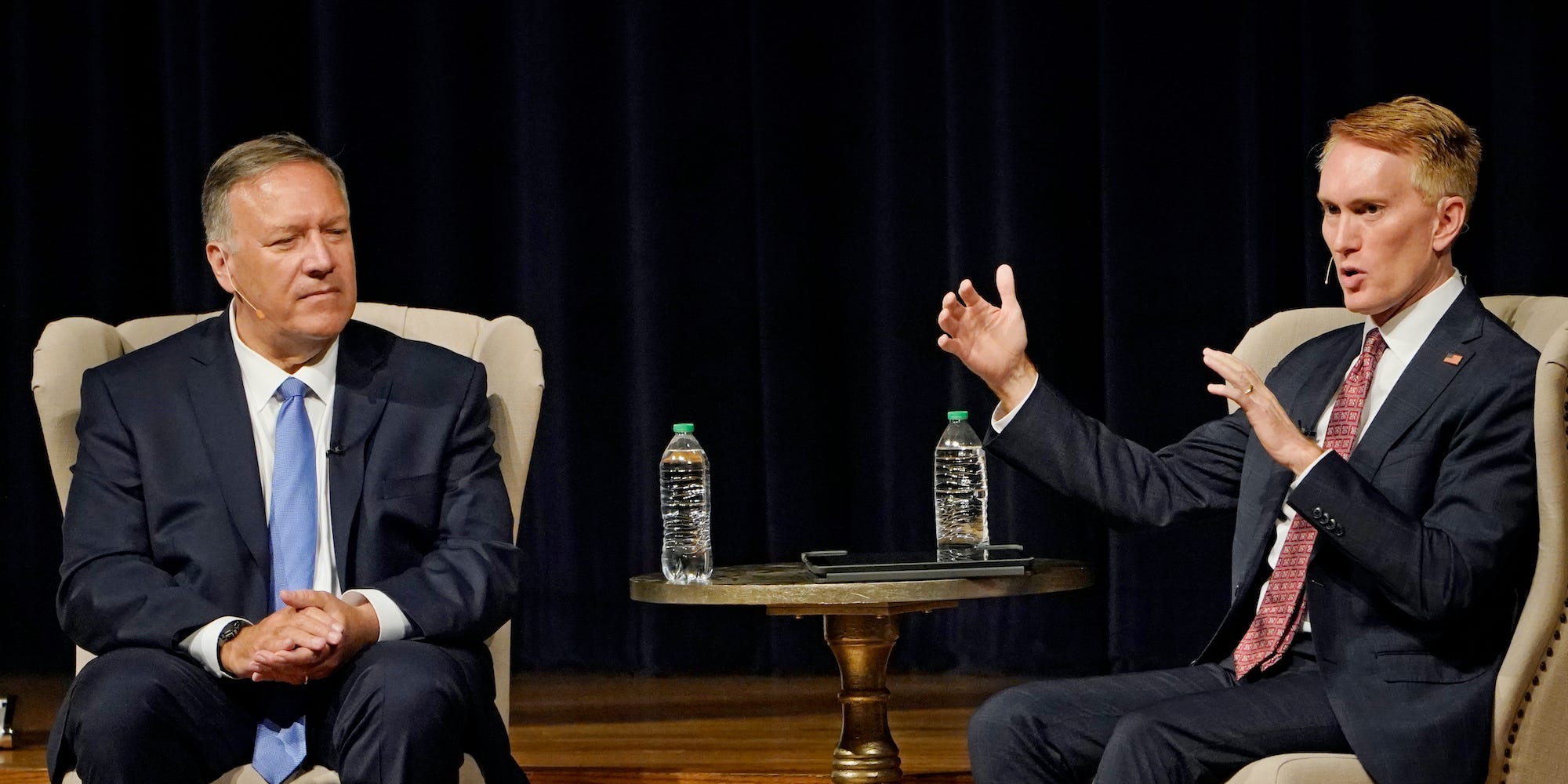 Former Secretary of State Mike Pompeo, left, and Sen. James Lankford, right, R-Okla., speak during a forum, Wednesday, Aug. 18, 2021, in Edmond, Okla