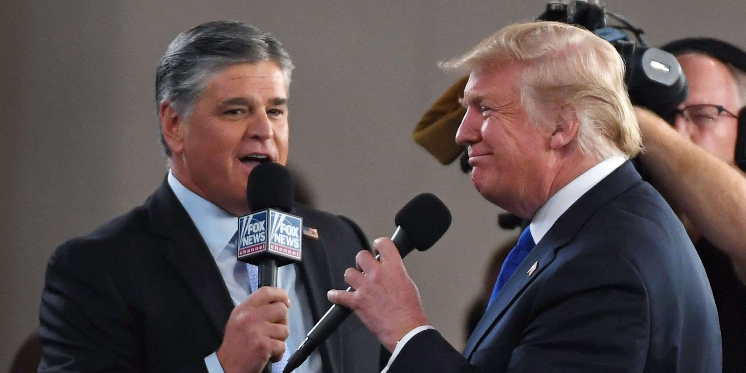 Fox News Channel and radio talk show host Sean Hannity (L) interviews U.S. President Donald Trump before a campaign rally at the Las Vegas Convention Center on September 20, 2018 in Las Vegas, Nevada.