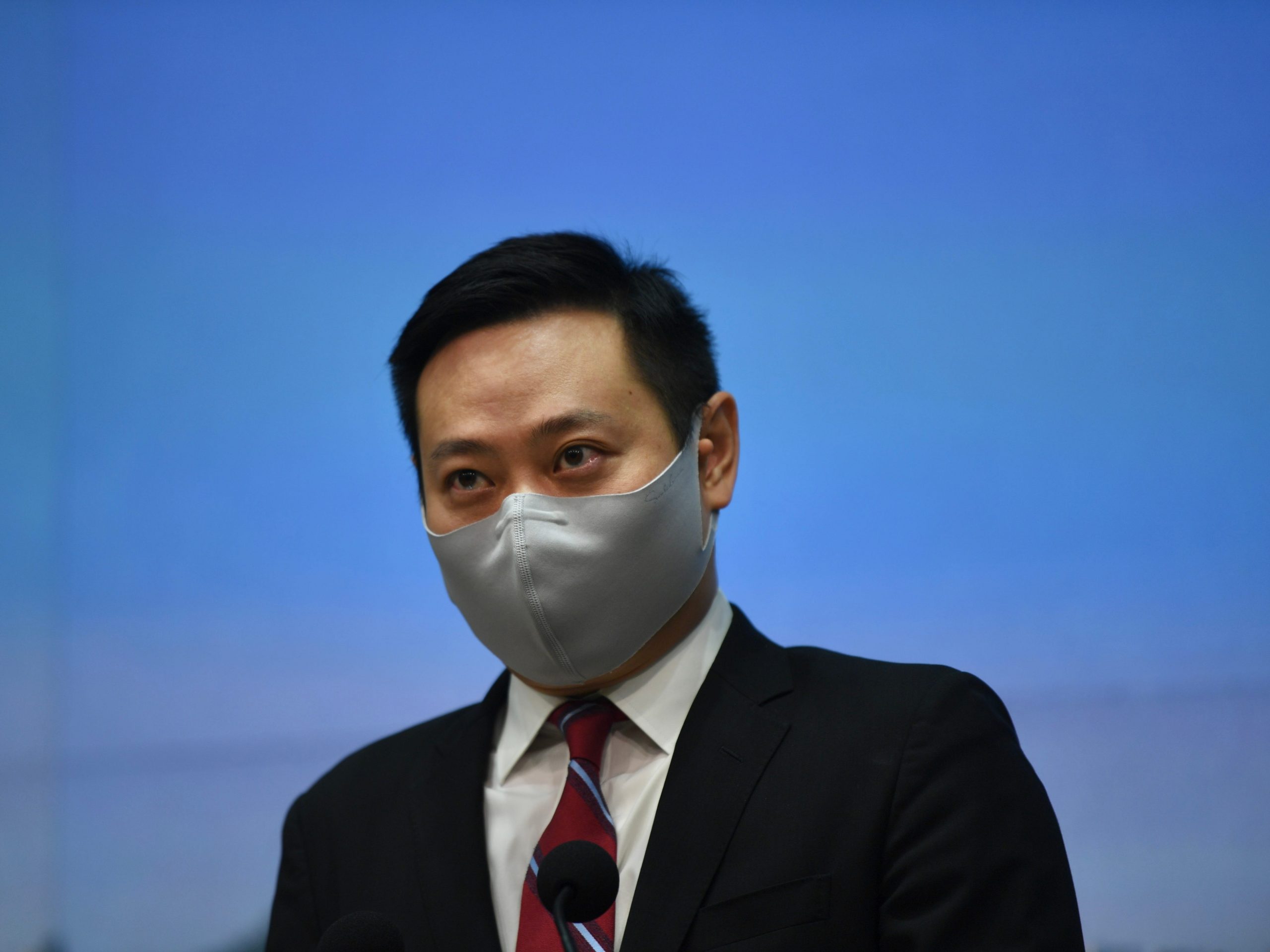 Hong Kong Secretary for Home Affairs, Caspar Tsui Ying-wai with face mask.