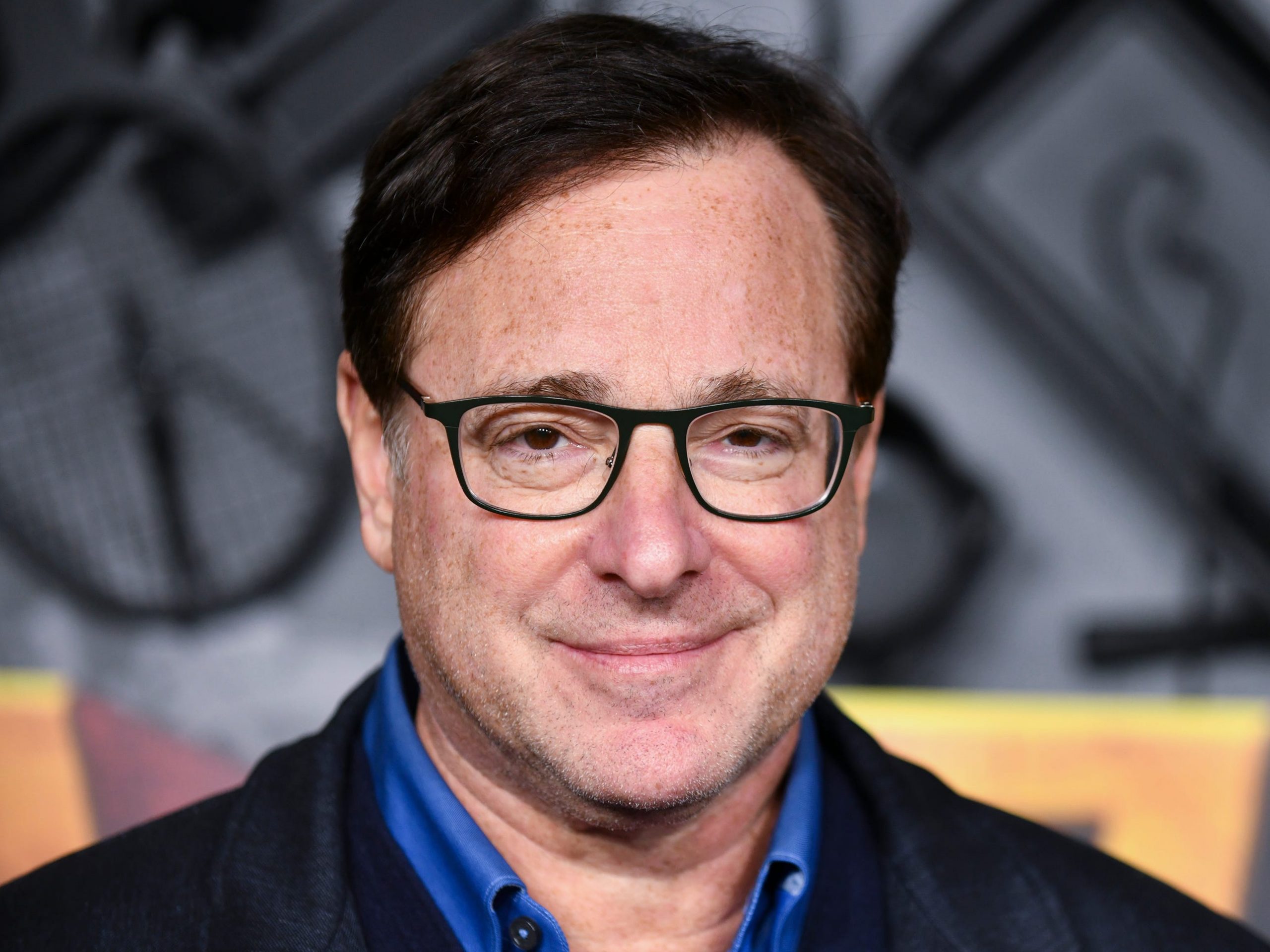 Bob Saget attends the red carpet premiere & party for Peacock's new comedy series "MacGruber" at California Science Center on December 08, 2021 in Los Angeles, California.