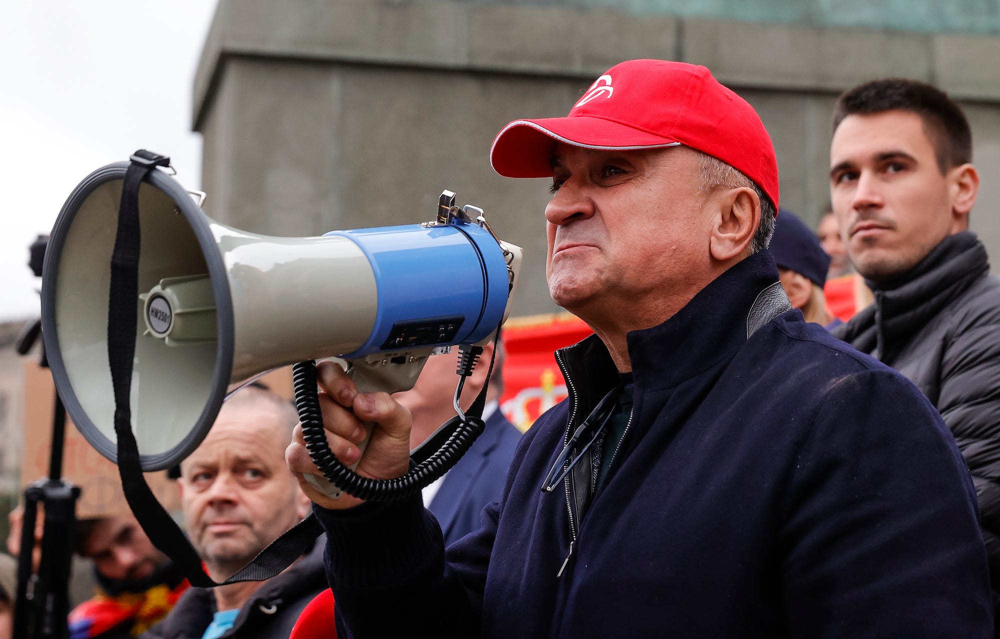 Srdan Djokovic father of Serbian tennis player Novak Djokovic uses a megaphone to address a rally in front of Serbia's National Assembly as World No.1 tennis player Novak Djokovic fights deportation from Australia after his visa was cancelled