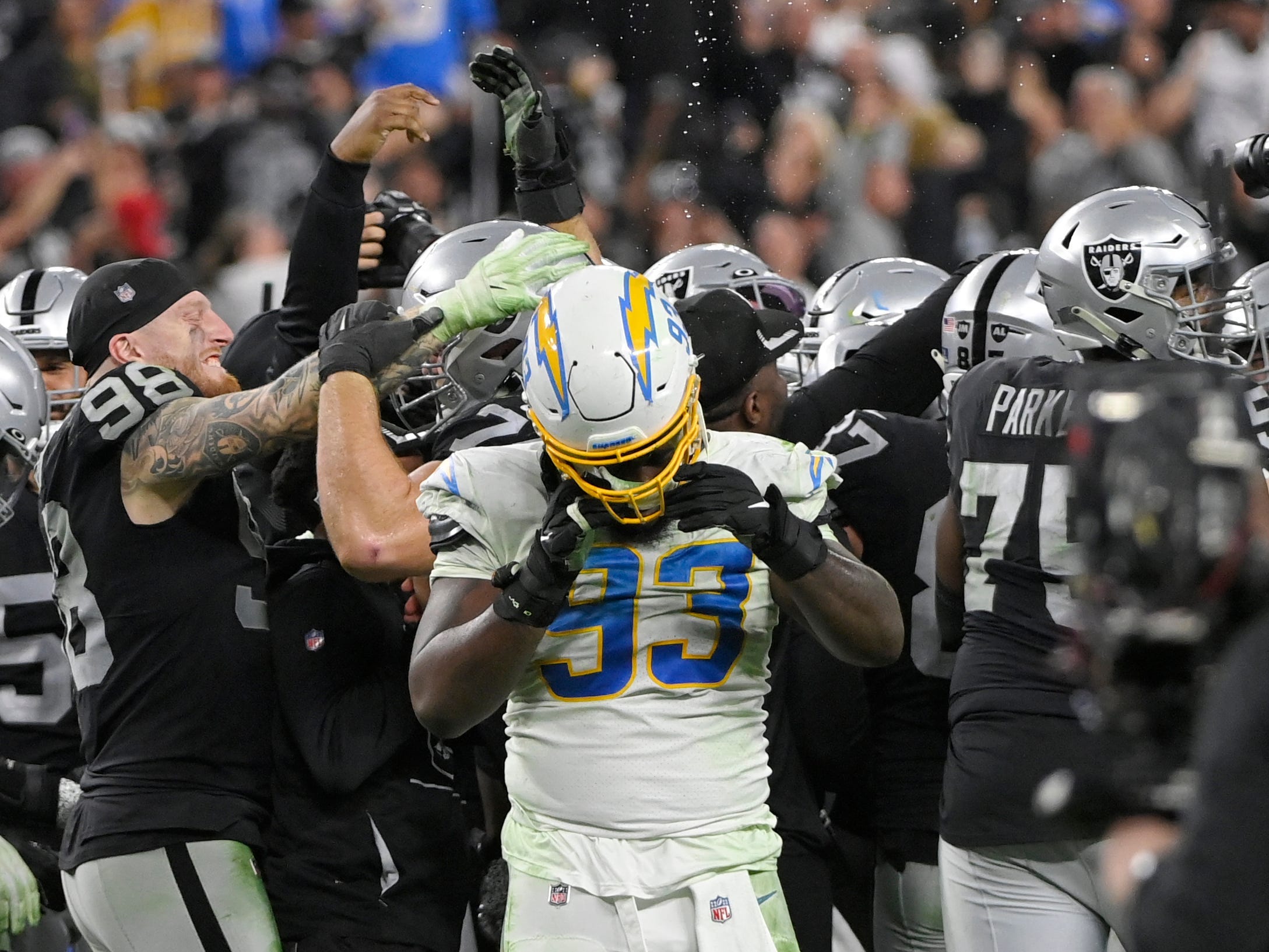 Las Vegas Raiders celebrate Week 18 win over Los Angeles Chargers.
