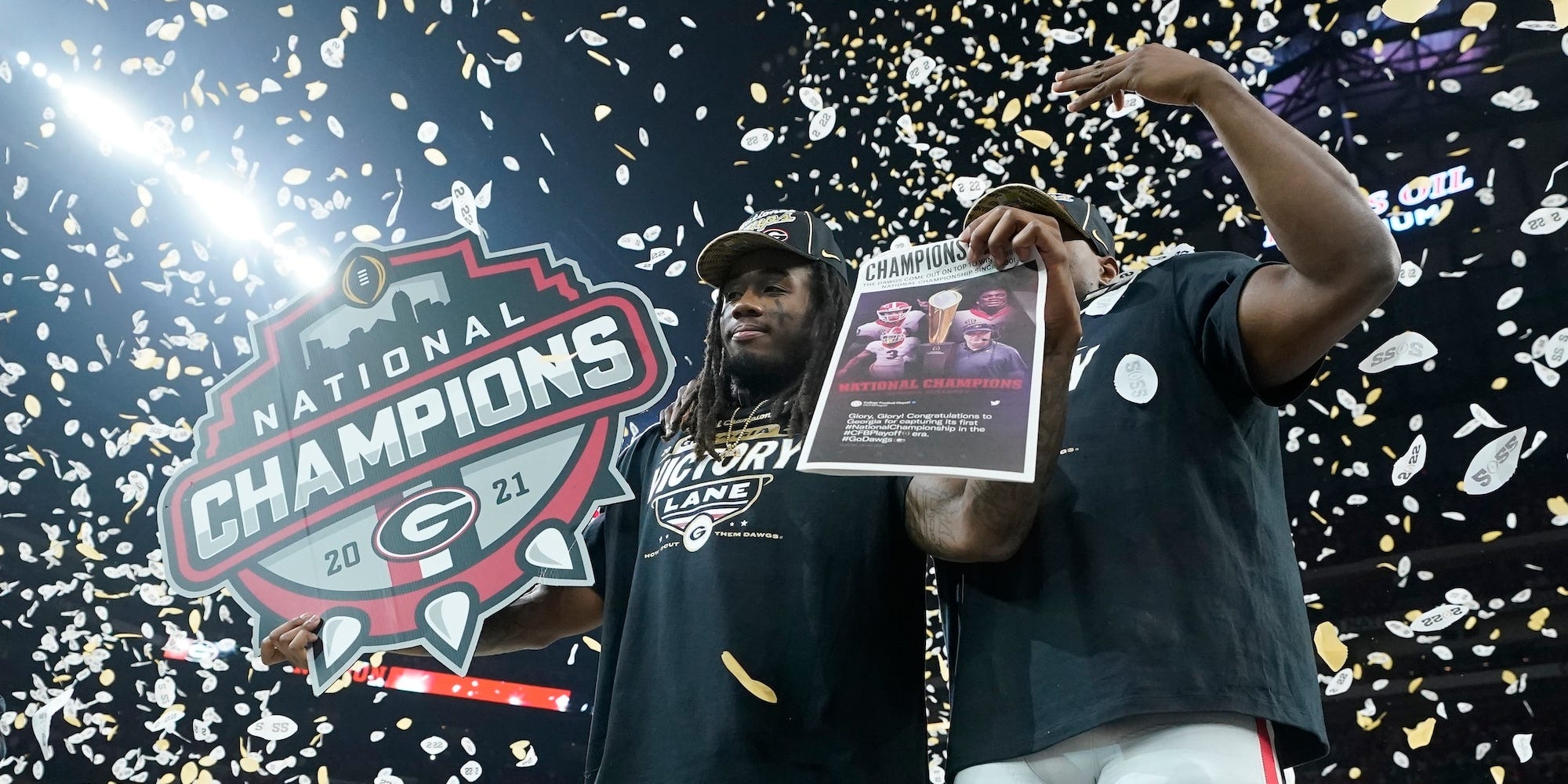 Georgia players celebrate after the College Football Playoff championship football game Tuesday, Jan. 11, 2022, in Indianapolis. Georgia won 33-18