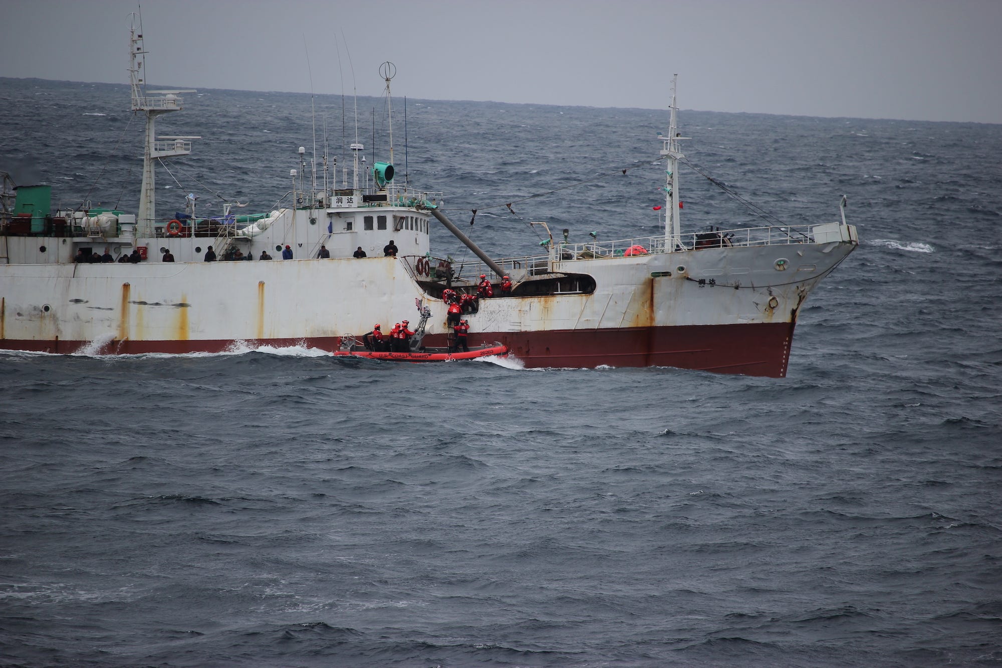 Coast Guard cutter Alex Haley boarding team fishing vessel