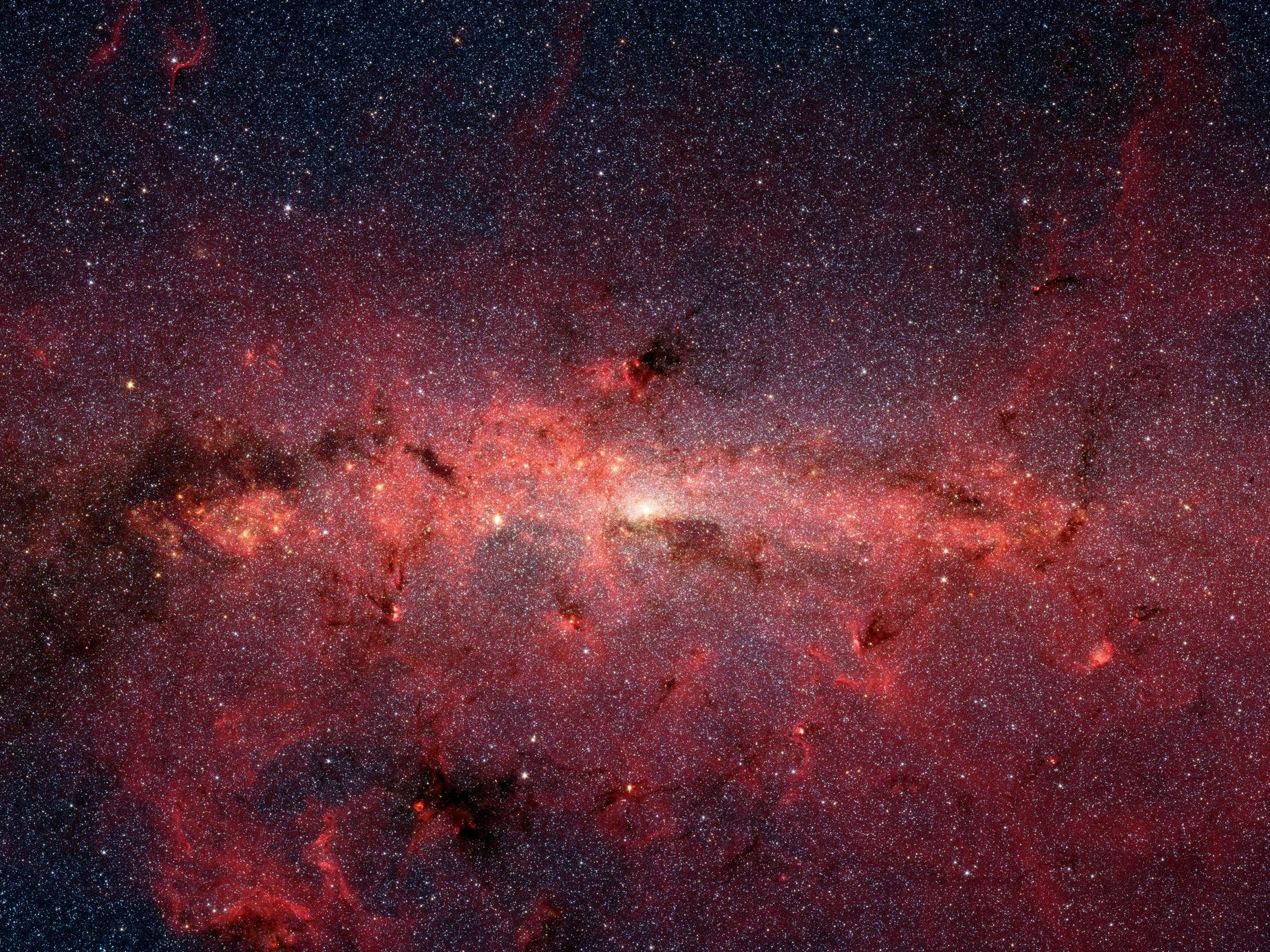 milky way center red dust crowded with stars