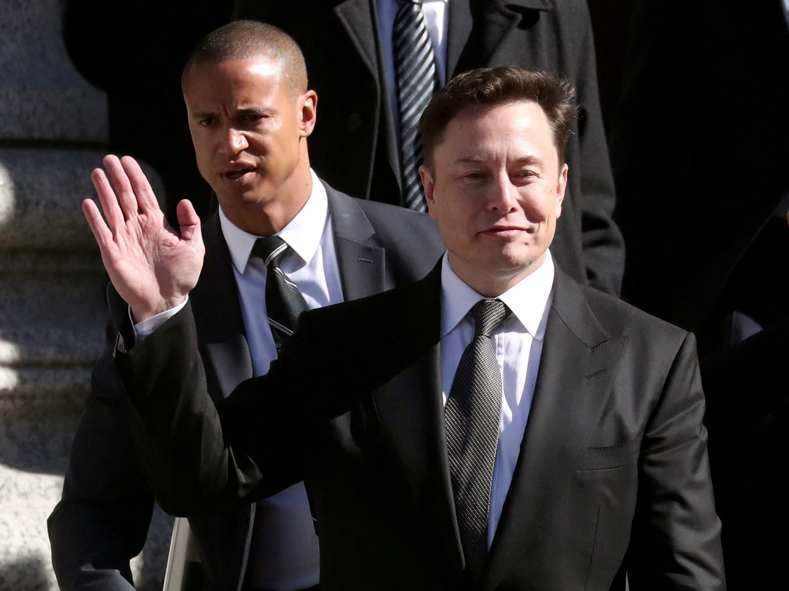 Tesla CEO Elon Musk waving.