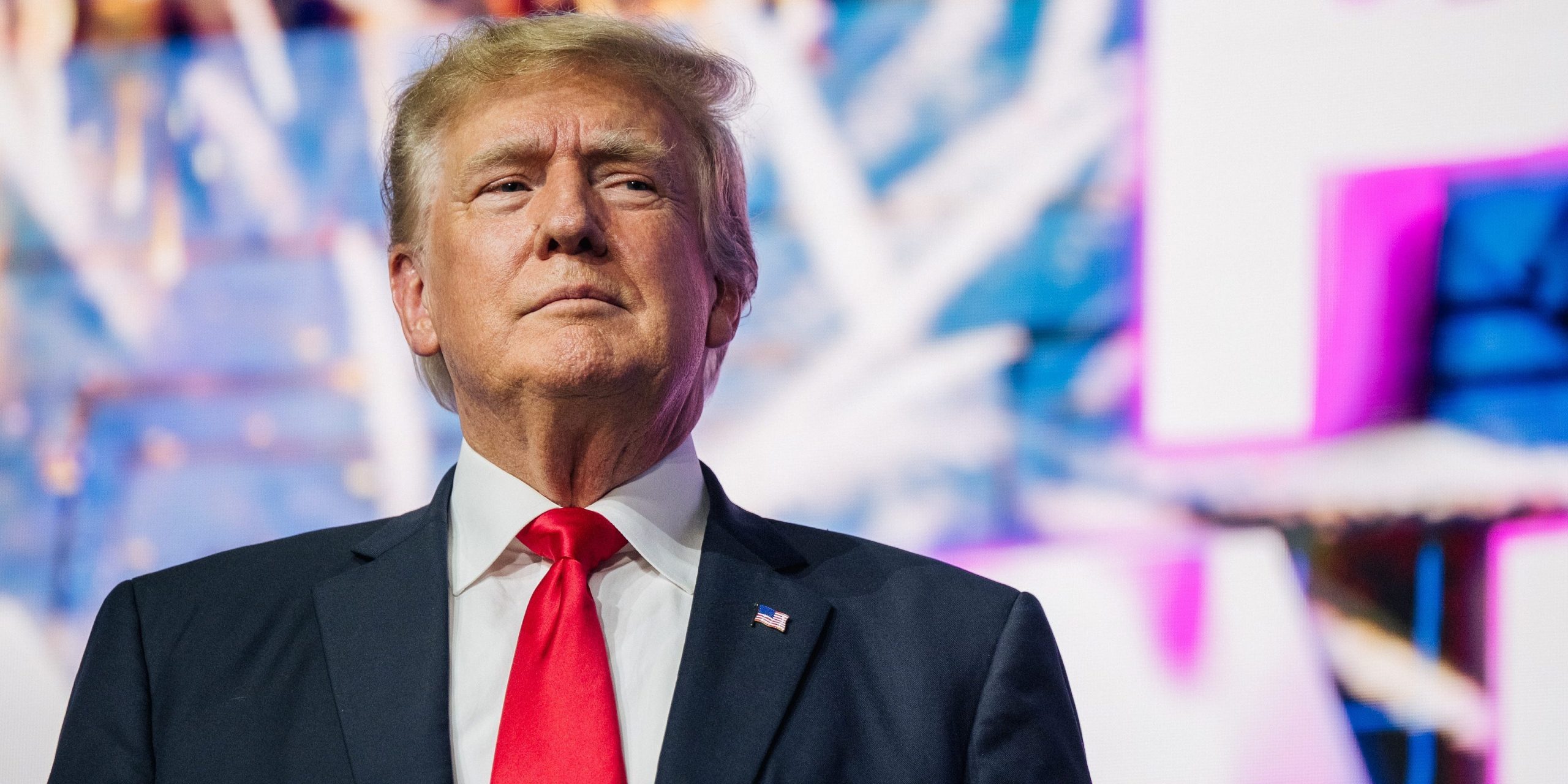 Former USs President Donald Trump makes an entrance at the Rally To Protect Our Elections conference on July 24, 2021 in Phoenix, Arizona.