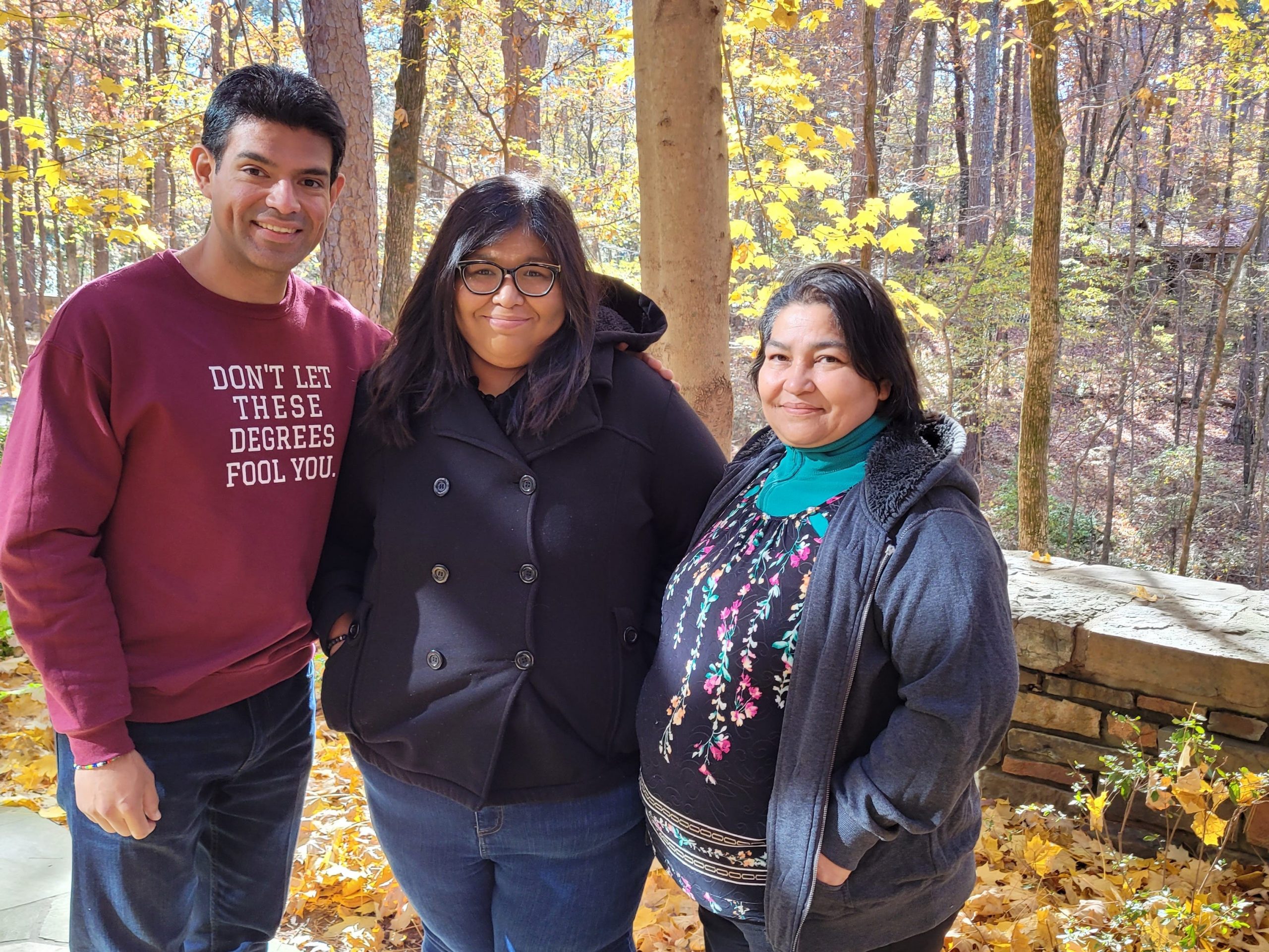 Juan Antonio Sorto, 36, with his sister and mother.