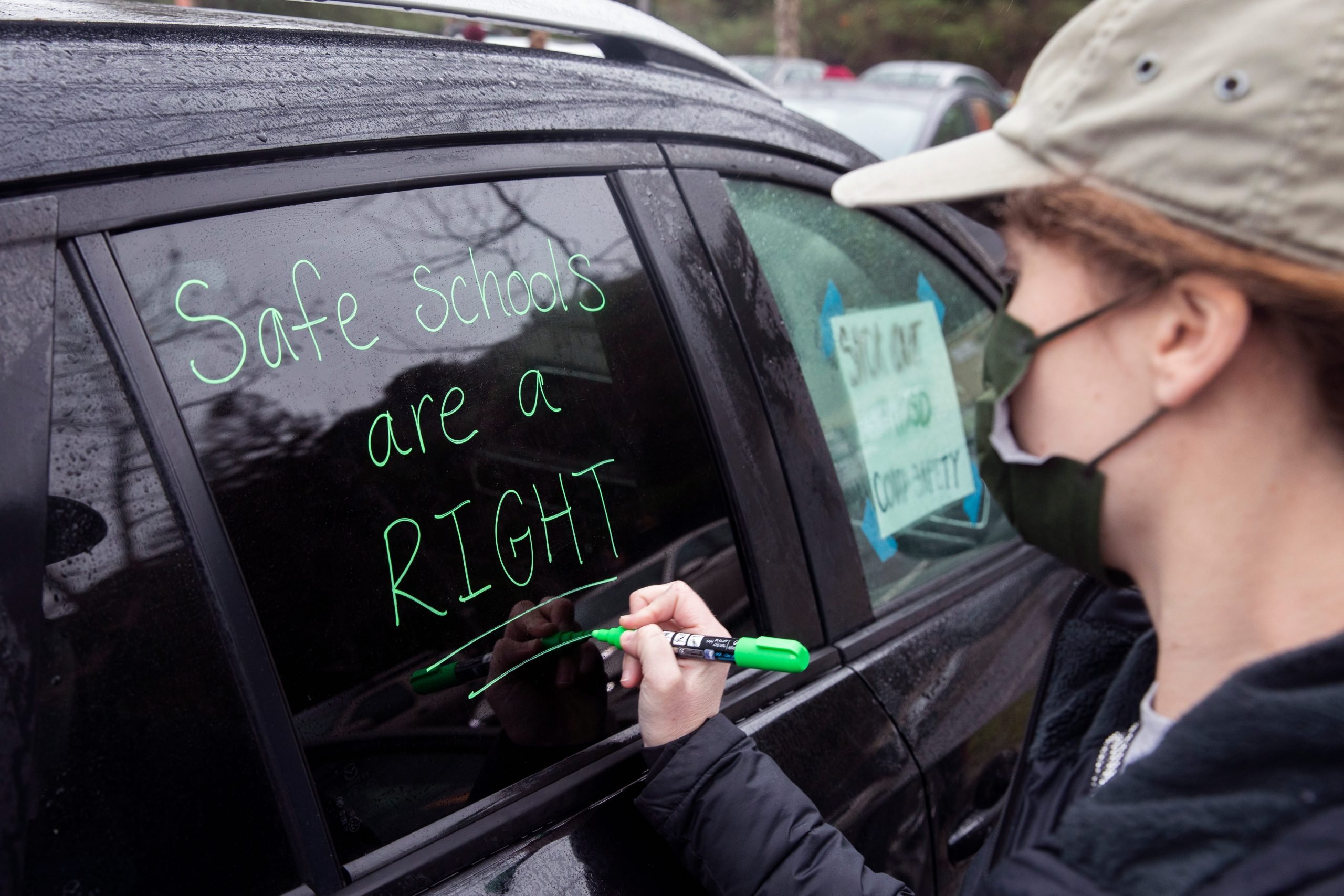 Garfield Elementary kindergarten teacher Katya Meltaus decorates her car before a teacher protest outside Oakland school district in January 2022.