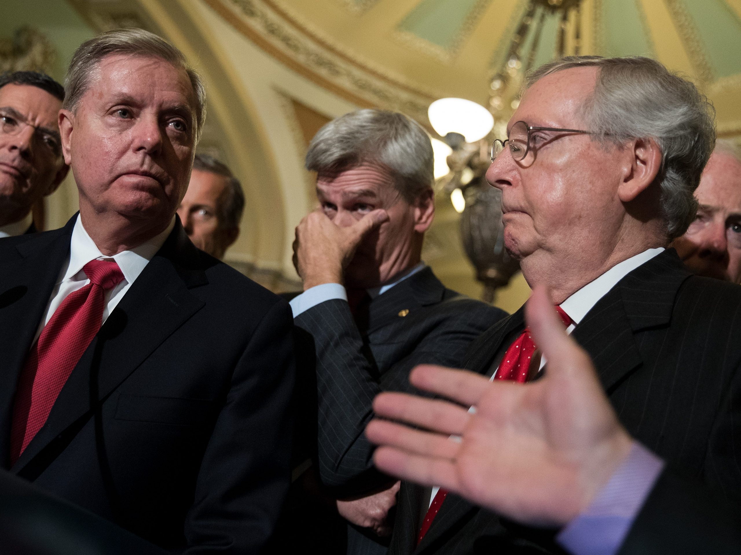 (L to R) Senators John Barrasso (R-WY), Lindsey Graham (R-SC), Bill Cassidy (R-LA), Majority Leader Mitch McConnell (R-KY) and John Cornyn (R-TX) hold a news conference following their weekly policy luncheon, September 26, 2017 in Washington, DC.