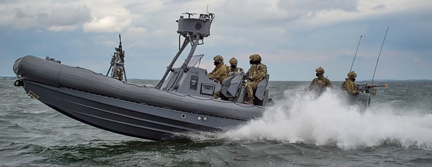 Danish Frømandskorpset operators aboard rigid-hull inflatable boat