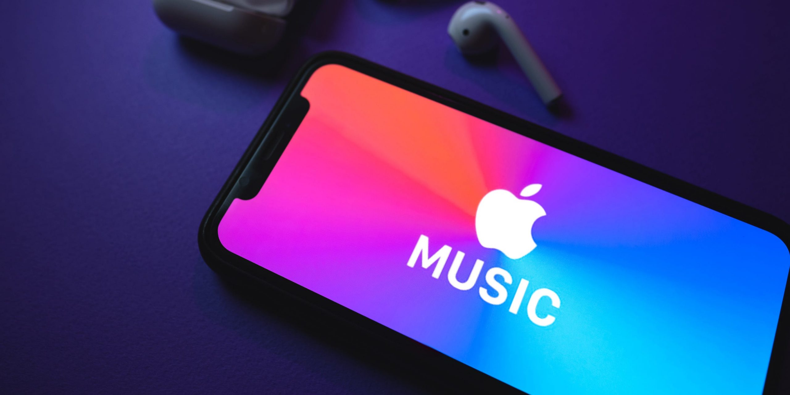An iPhone displaying the Apple Music logo.