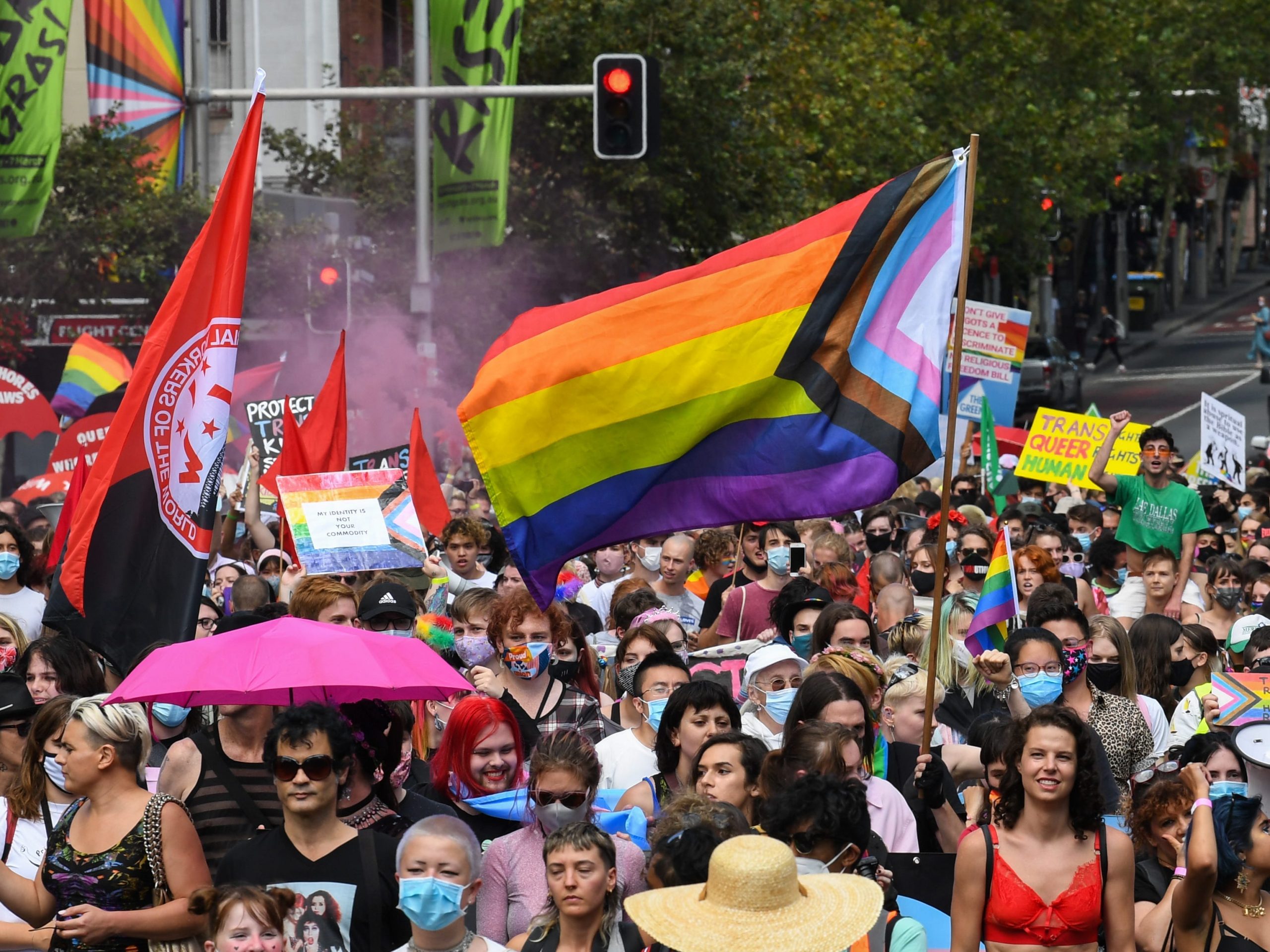 Protesters march ahead of the Sydney Gay and Lesbian Mardi Gras parade as they campaign for LGBTQI rights along Oxford Street on March 06, 2021 in Sydney, Australia.