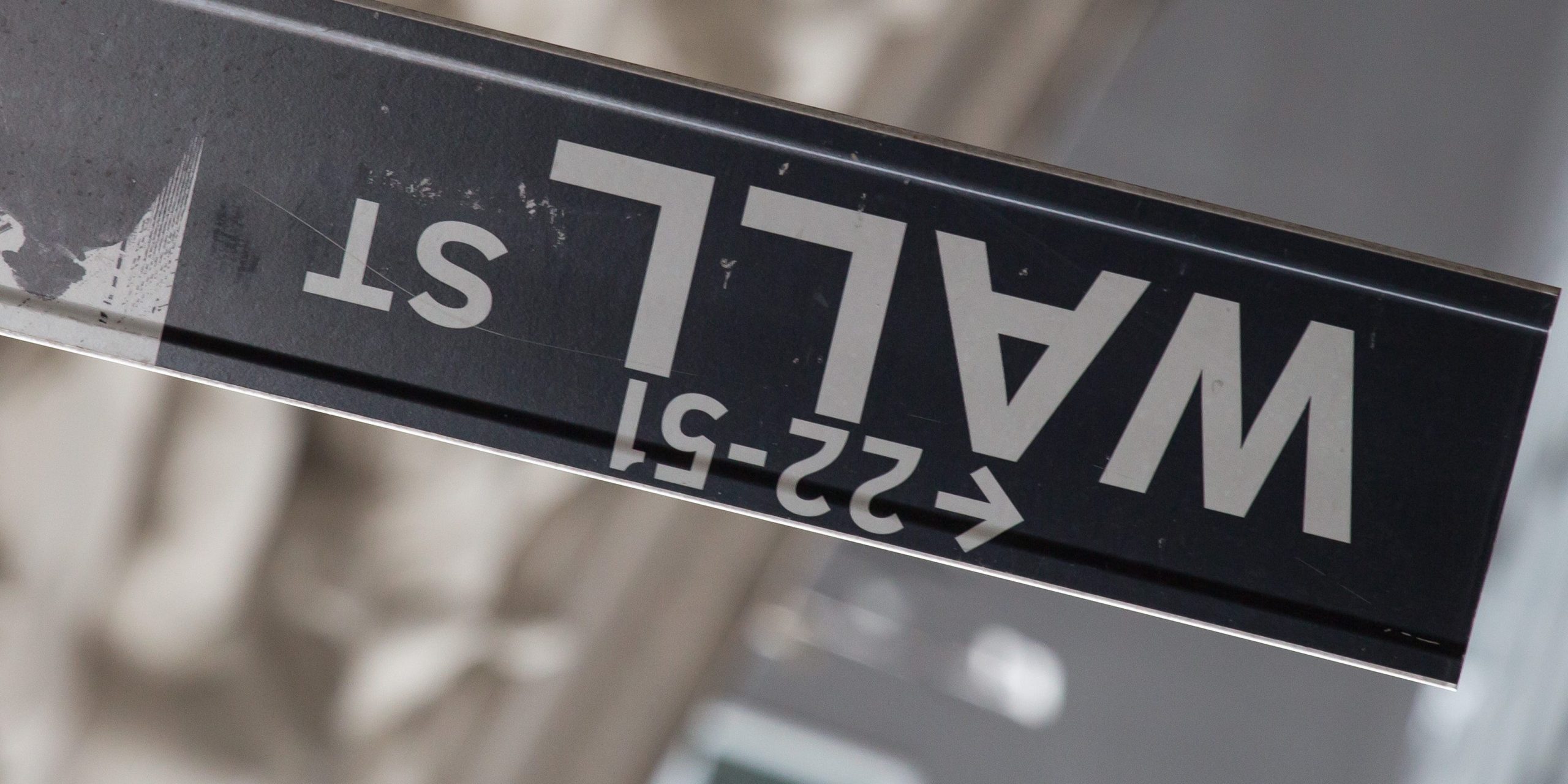 Wall Street sign turned upside down